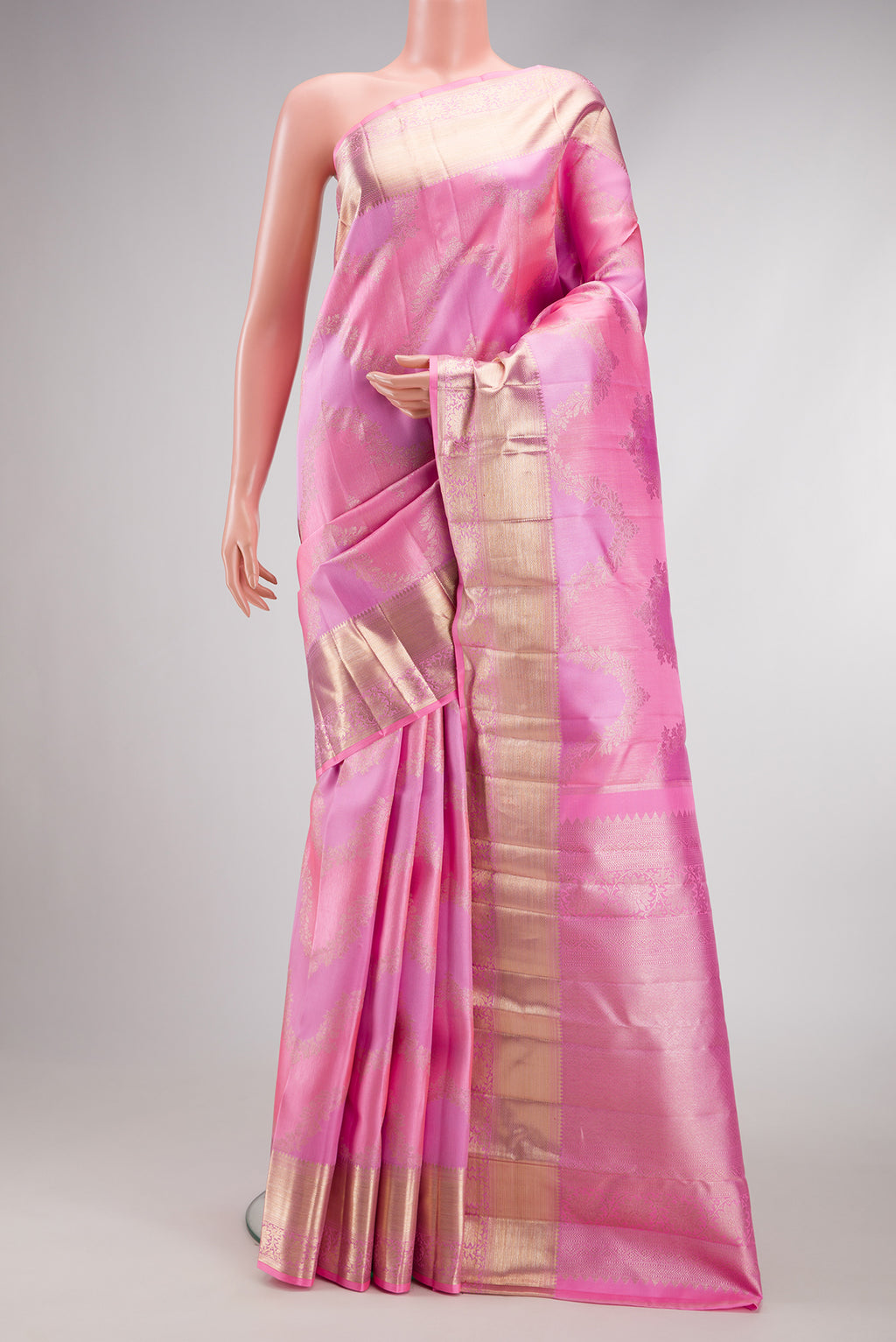 Pink Dual Tone Kanjivaram Silk Saree with Zari Brocade on the body and Zari Border.  displayed on a mannequin