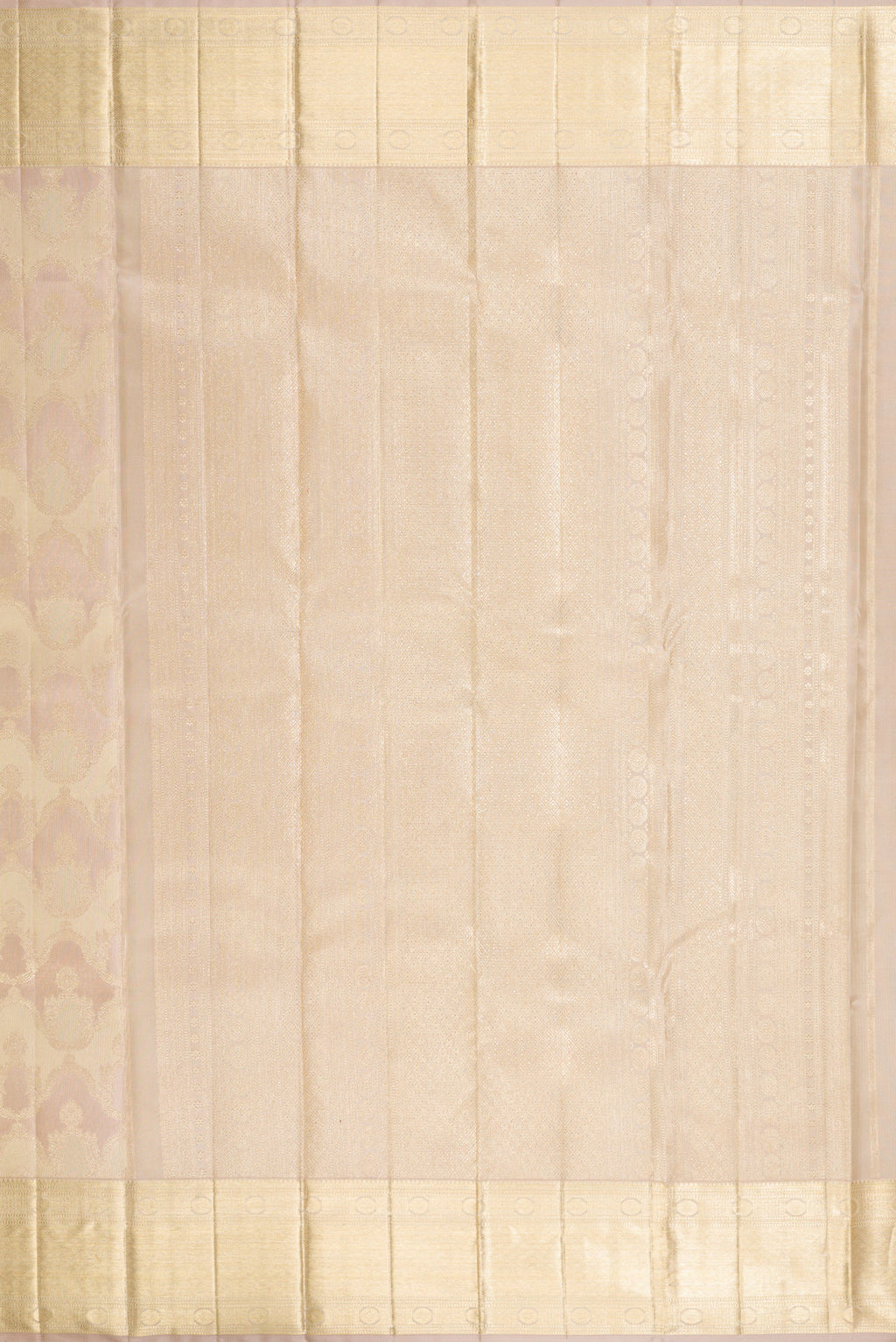 Close up image of the pallu of Rose Gold Dual Tone Kanjivaram Silk Saree with Zari Brocade on the body and Zari Border. 