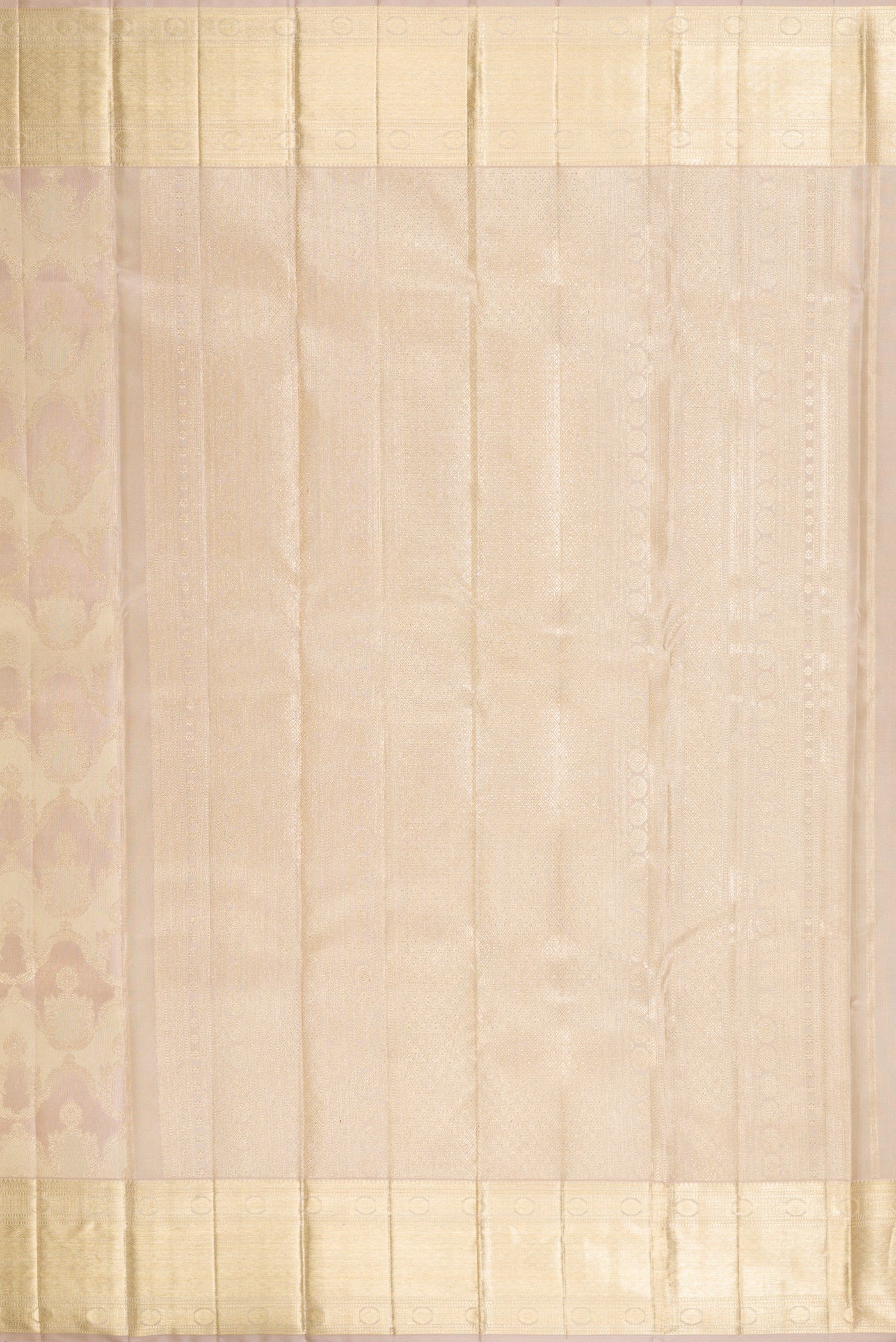 Close up image of the pallu of Rose Gold Dual Tone Kanjivaram Silk Saree with Zari Brocade on the body and Zari Border. 