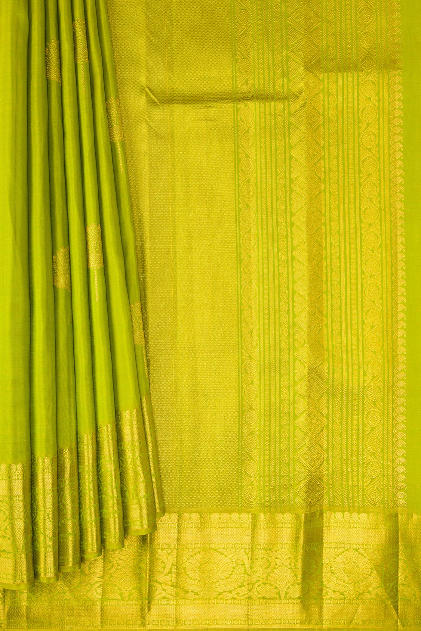Pleats and pallu of Parrot Green Kanjivaram Silk Saree with Zari Butta on the body and Zari Border. 