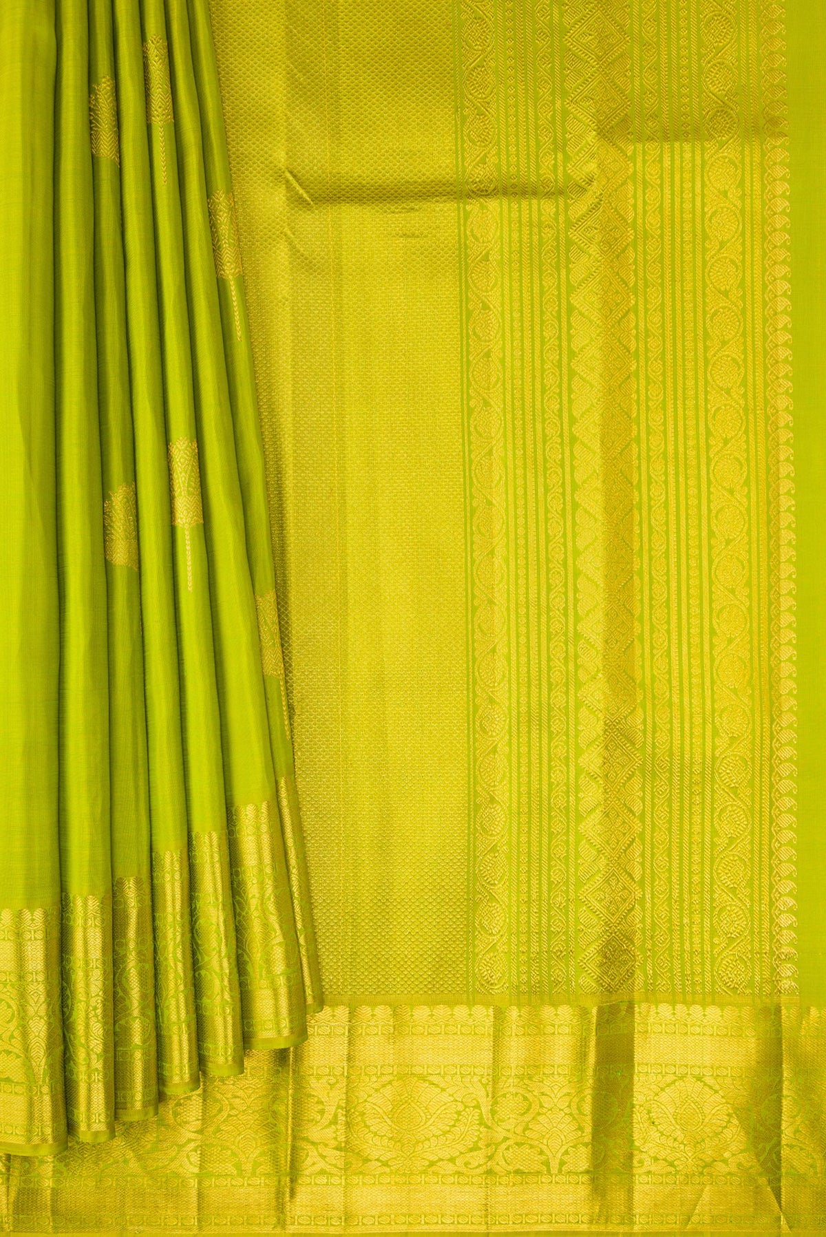 Pleats and pallu of Parrot Green Kanjivaram Silk Saree with Zari Butta on the body and Zari Border. 