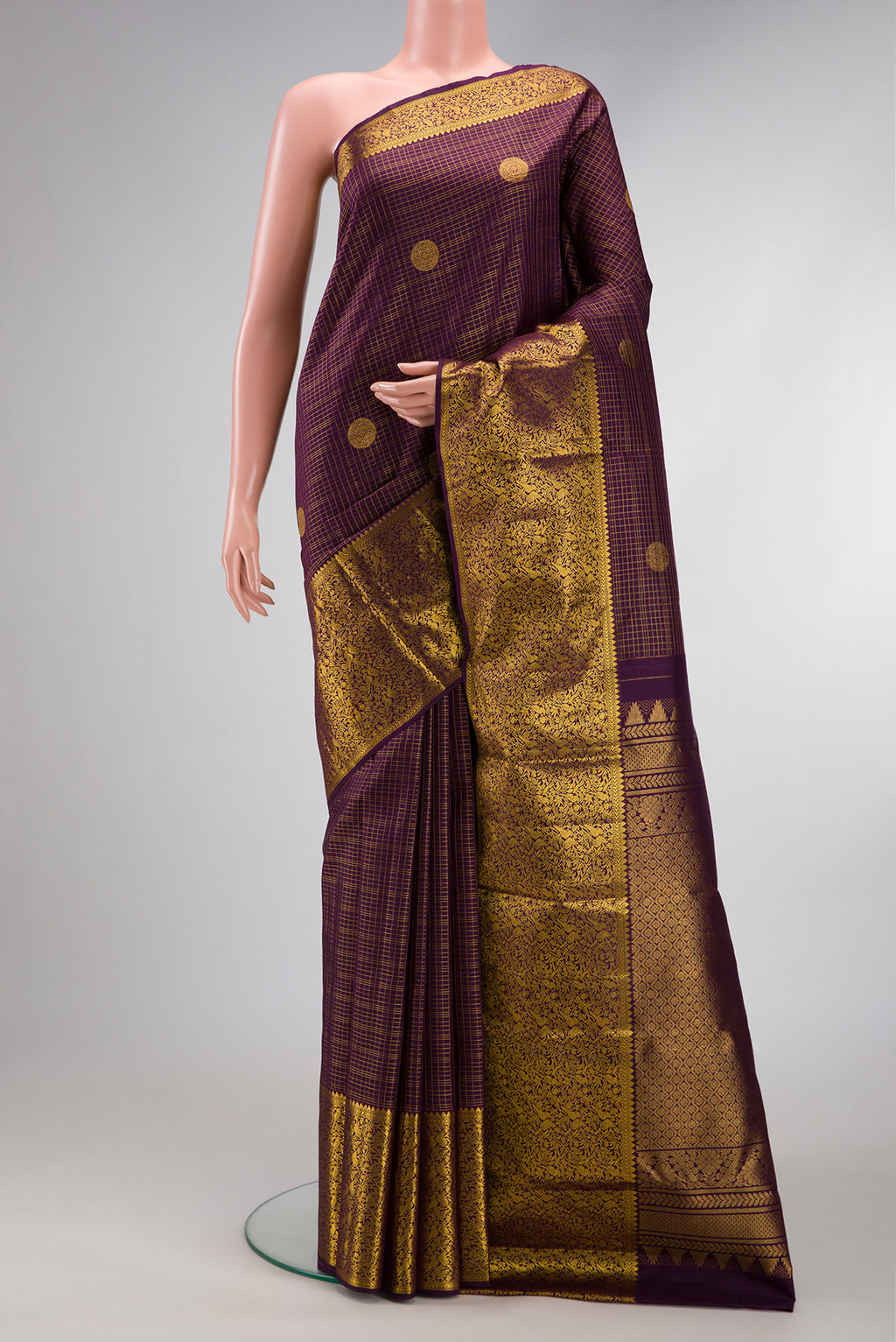 Burgundy Dual Tone Kanjivaram Silk Saree with Stripes on the body and Zari Border.  displayed on a mannequin
