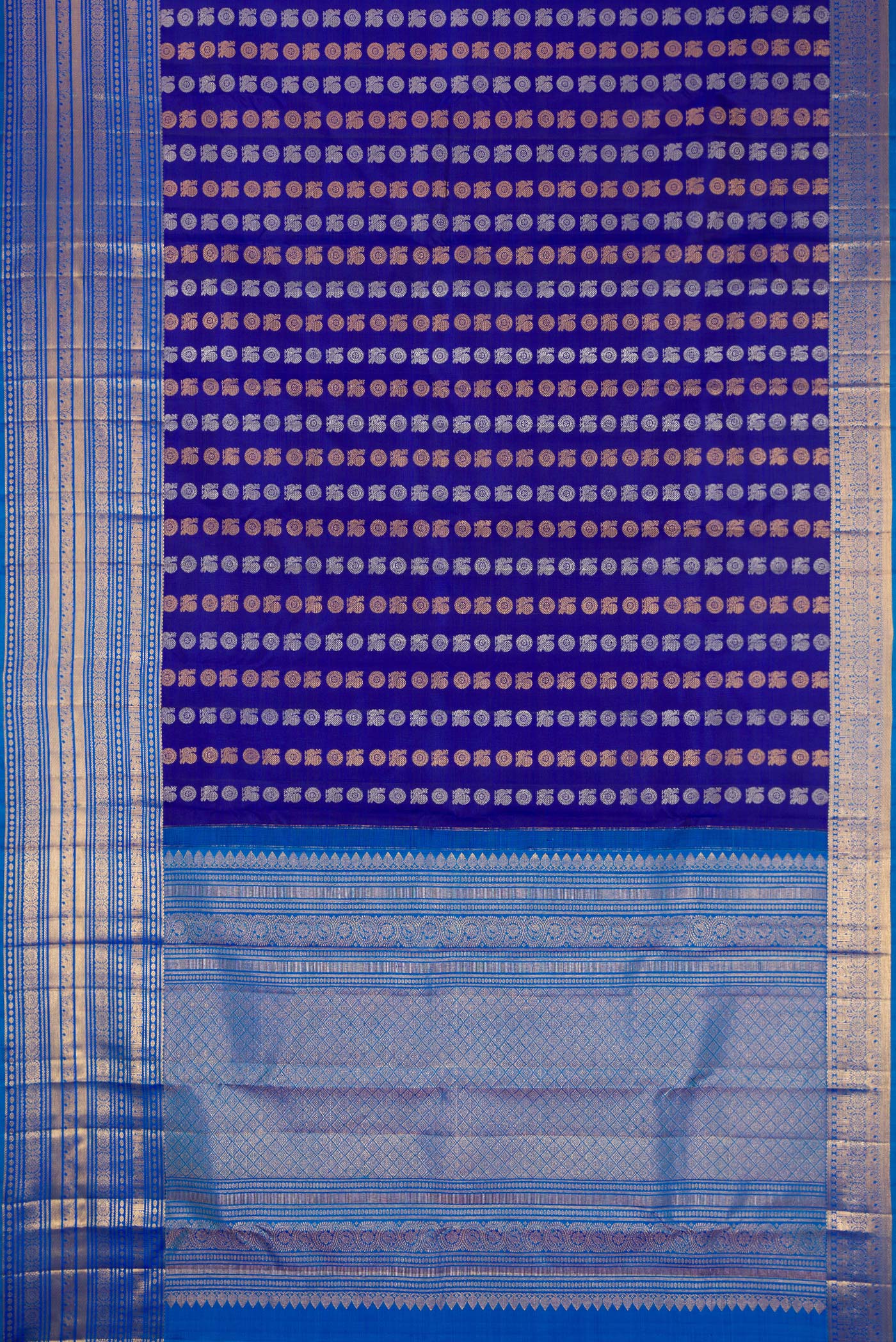 Flat view of Navy Blue Dual Tone Kanjivaram Silk Saree with Zari Butta on the body and Zari Border. 