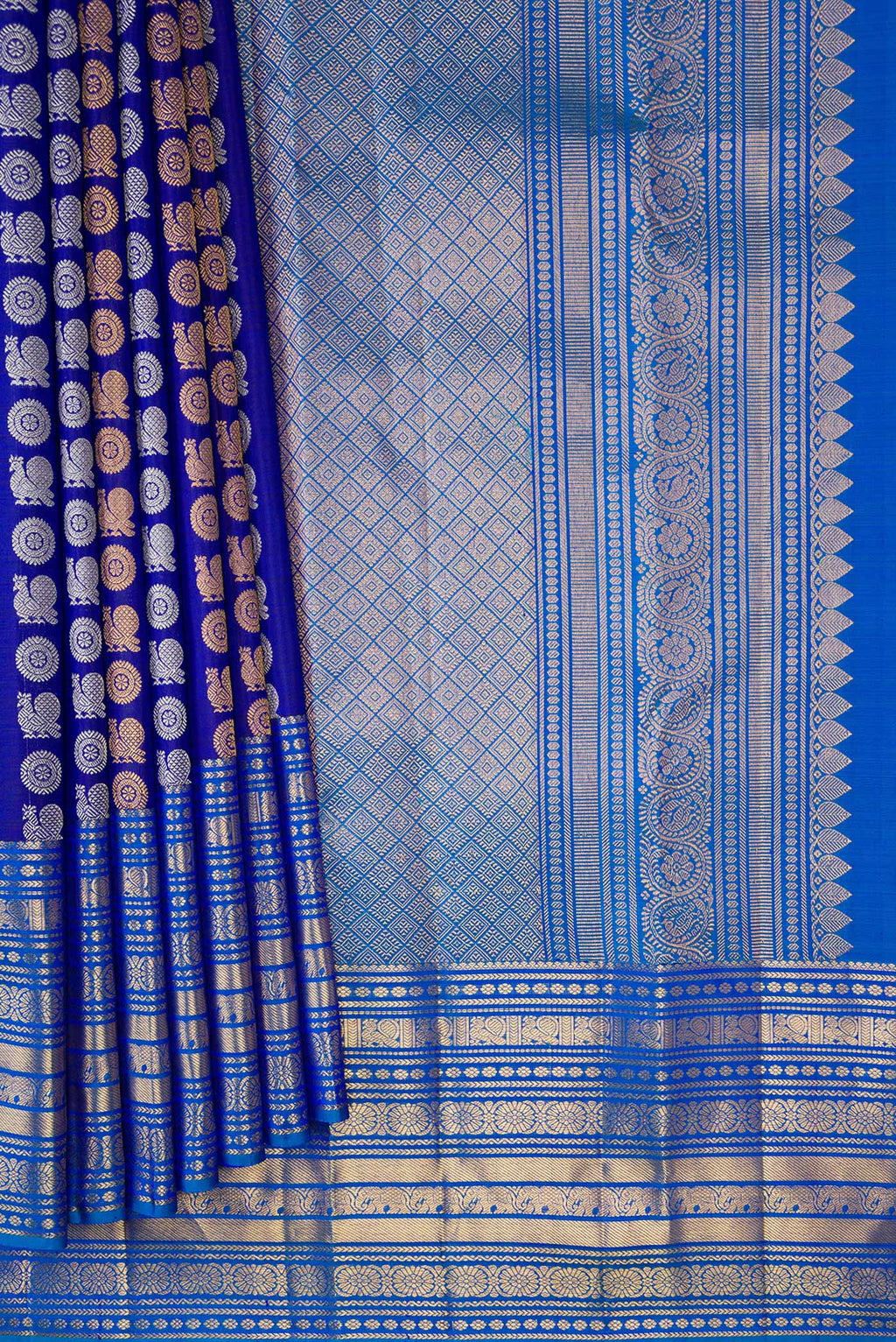 Pleats and pallu of Navy Blue Dual Tone Kanjivaram Silk Saree with Zari Butta on the body and Zari Border. 