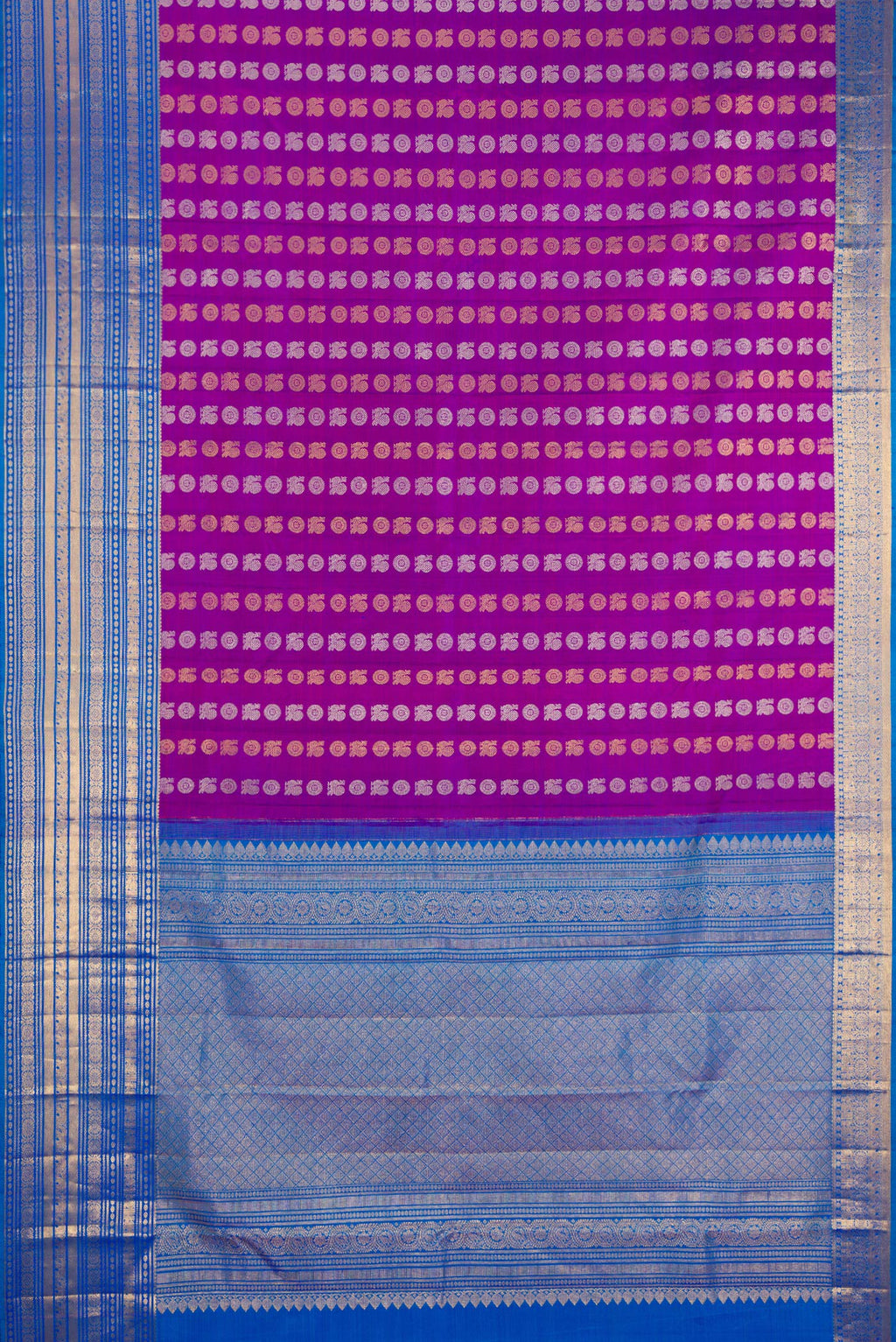 Flat view of Purple Kanjivaram Silk Saree with Zari Butta on the body and Zari Border. 