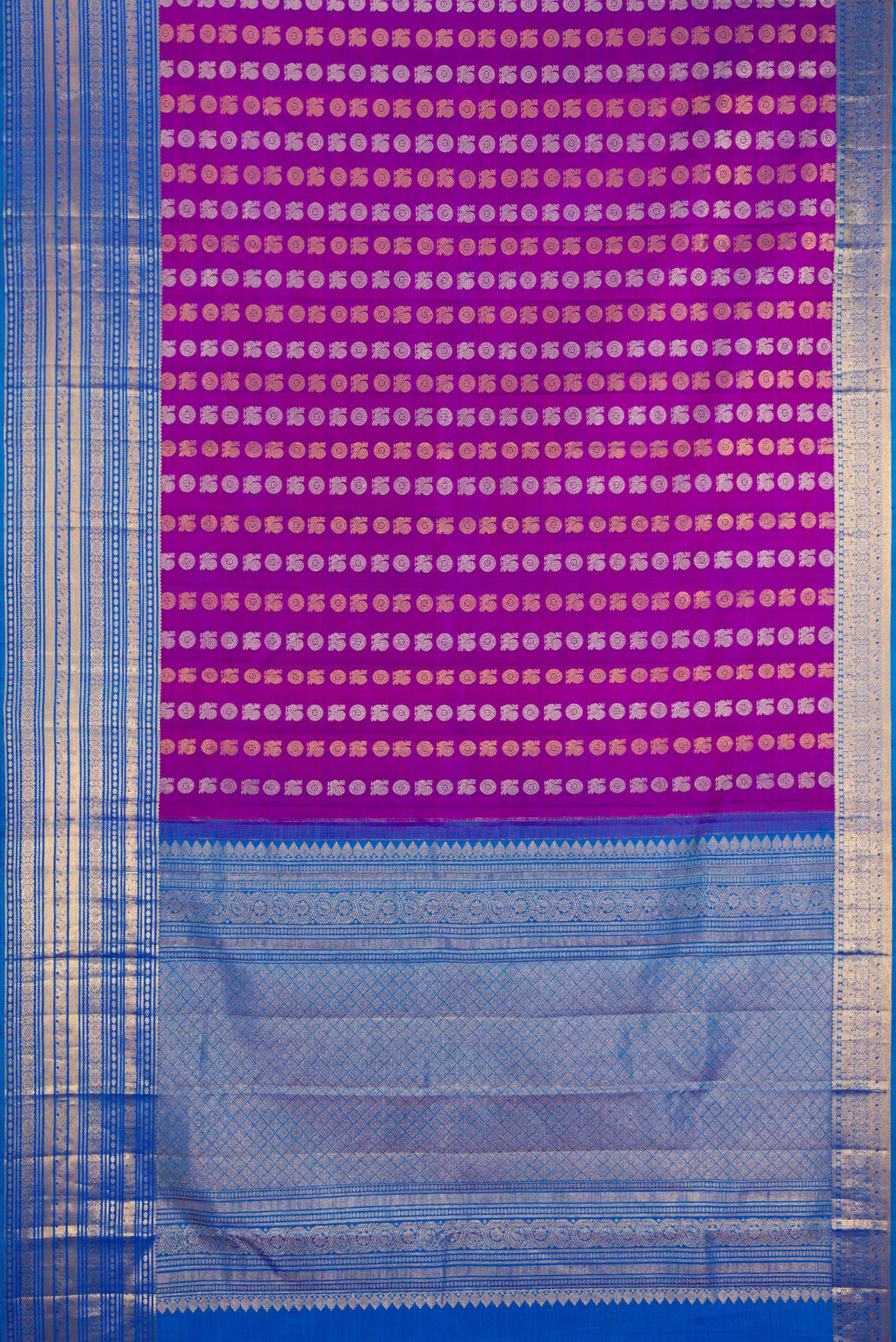 Flat view of Purple Kanjivaram Silk Saree with Zari Butta on the body and Zari Border. 