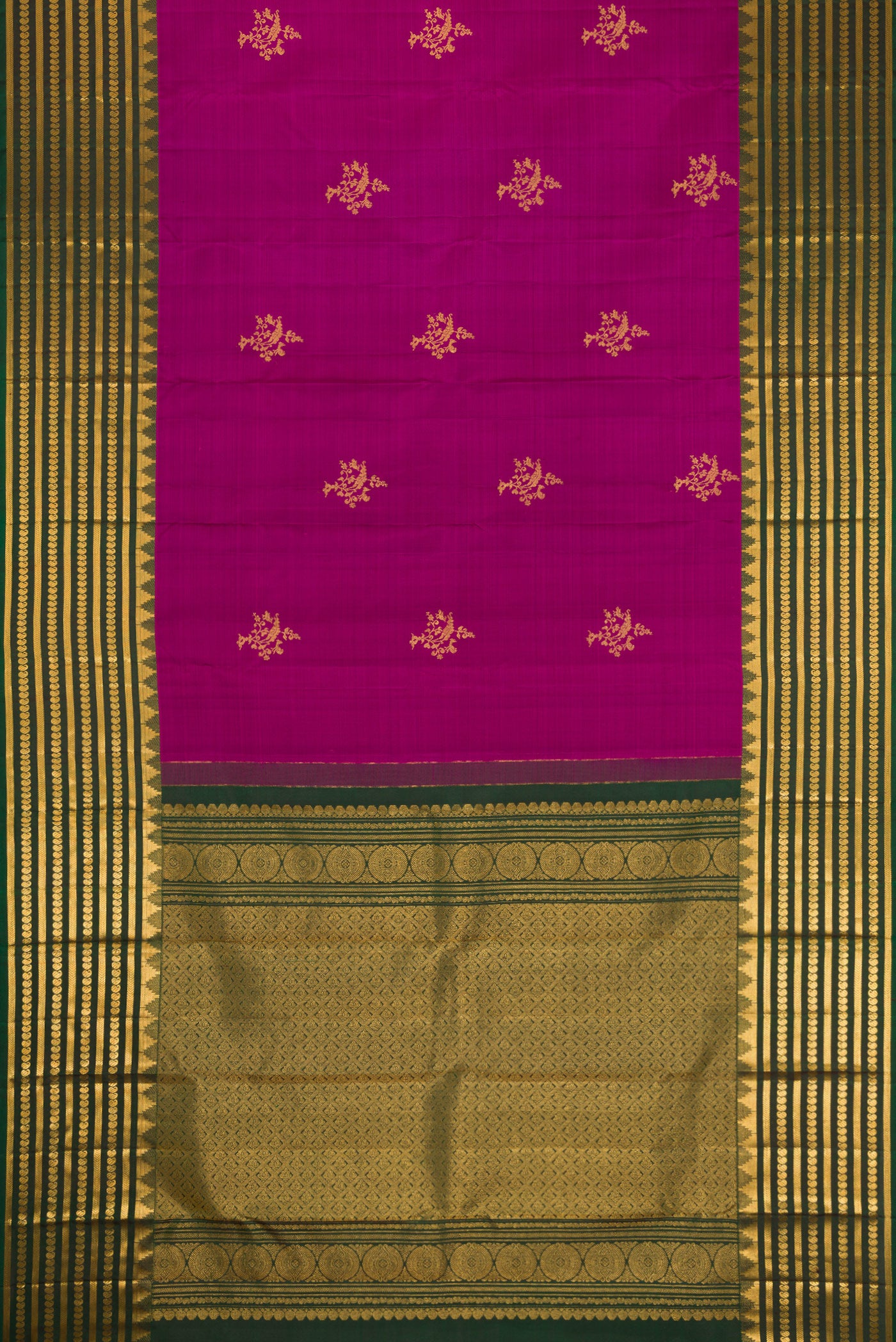 Flat view of Magenta Kanchipuram Silk Saree with Zari Butta on the body and Fancy Border. 