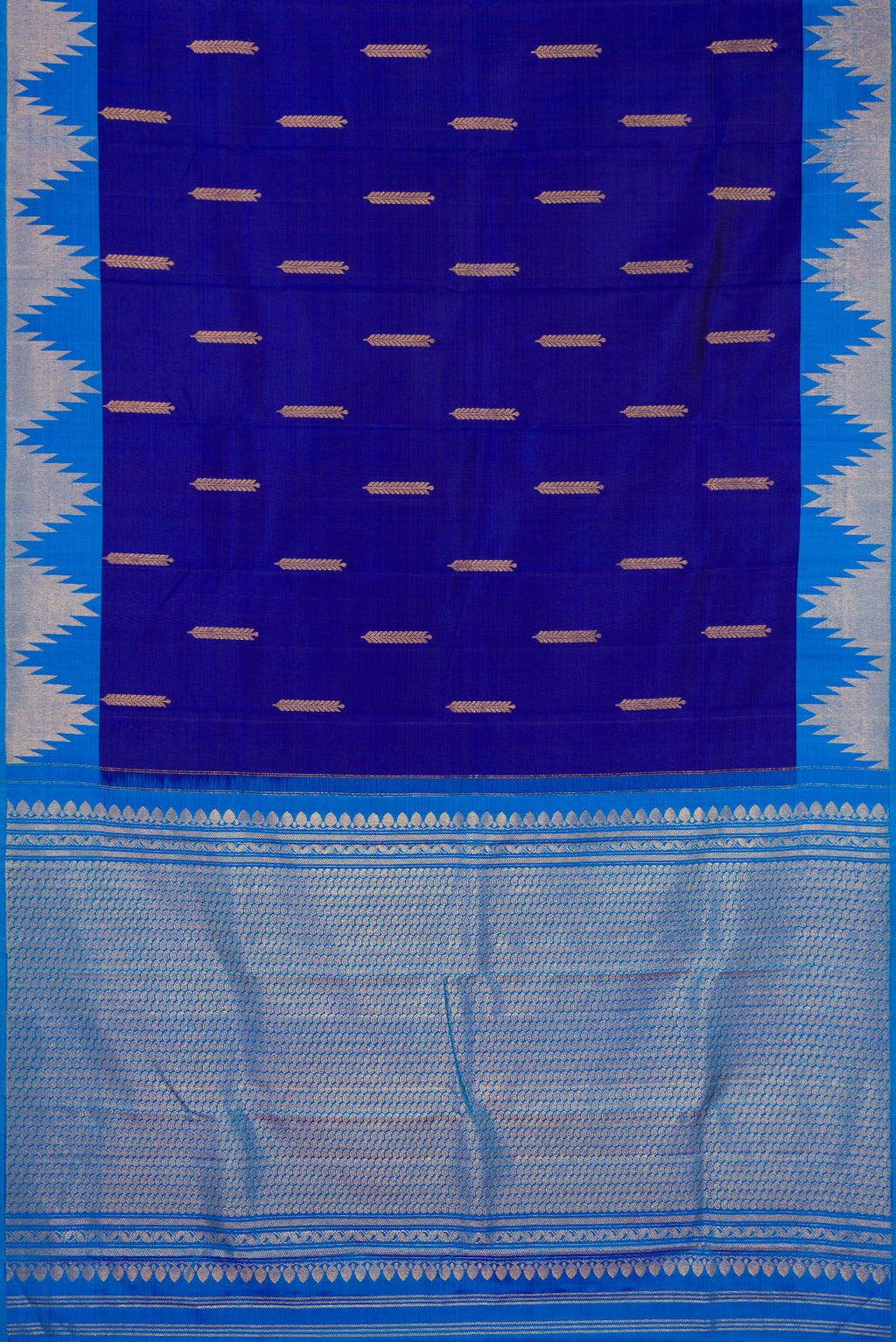Flat view of Navy Blue Kanjivaram Silk Saree with Zari Butta on the body and Temple Border. 