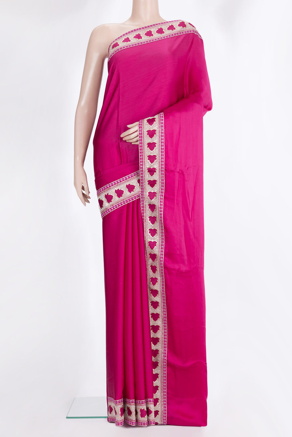Dark Pink Crepe Saree with Plain Body and Embroidered Border.  displayed on a mannequin