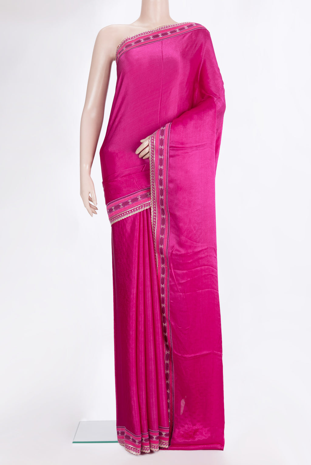 Dark Pink Crepe Saree with Plain Body and Embroidered Border.  displayed on a mannequin