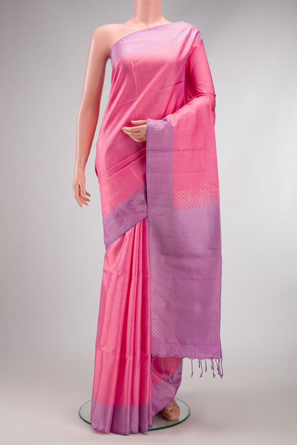 Pink Dual Tone Soft Silk Saree with Stripes on the body and Fancy Border.  displayed on a mannequin