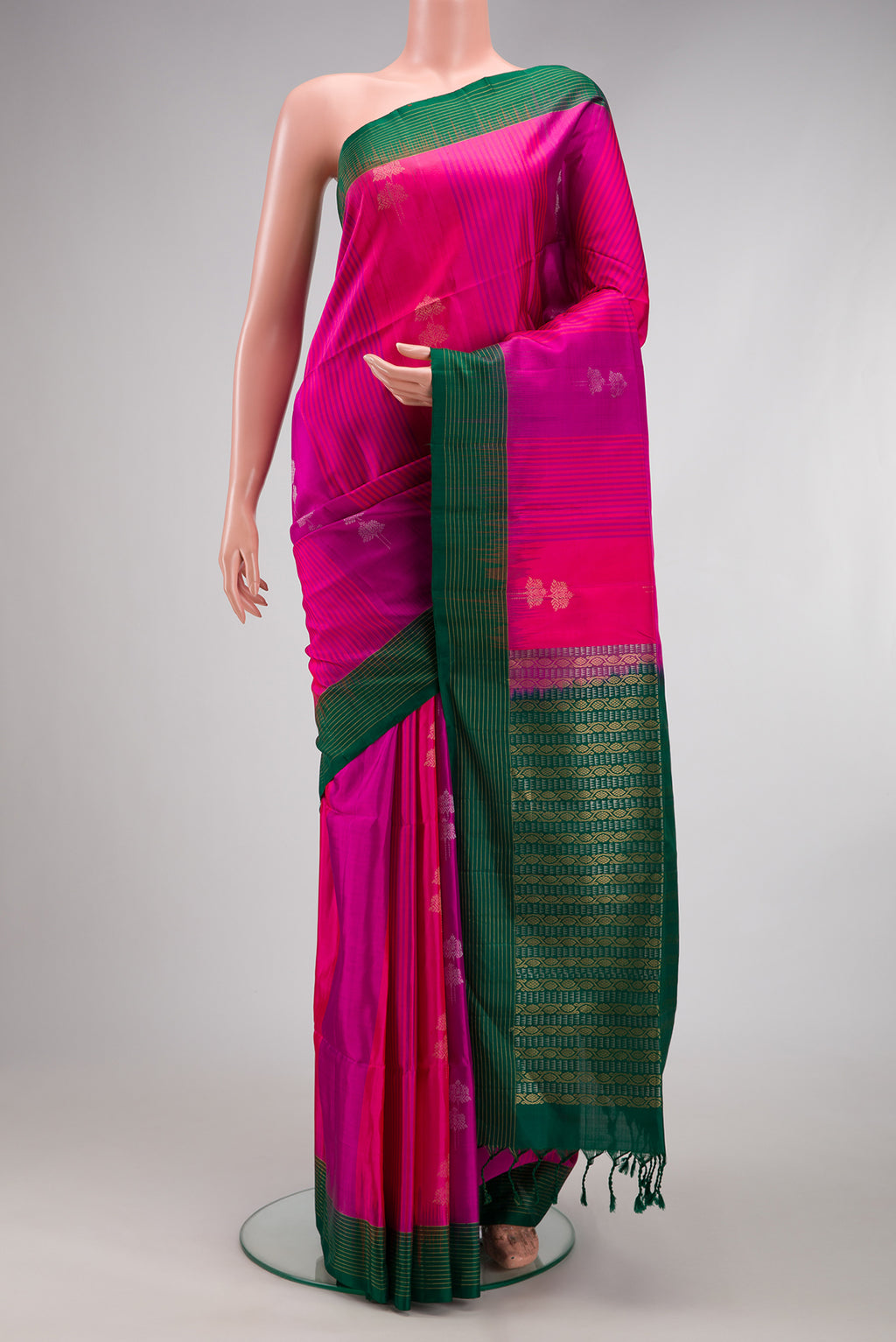 Multi Color Soft Silk Saree with Stripes on the body and Plain Border.  displayed on a mannequin