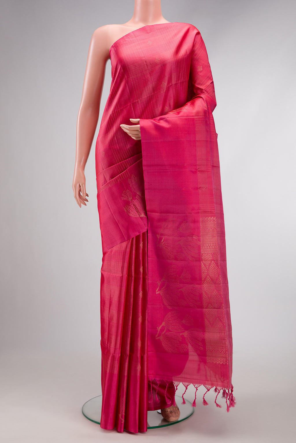 Pink Dual Tone Soft Silk Saree with Checked design on the body and Fancy Border.  displayed on a mannequin