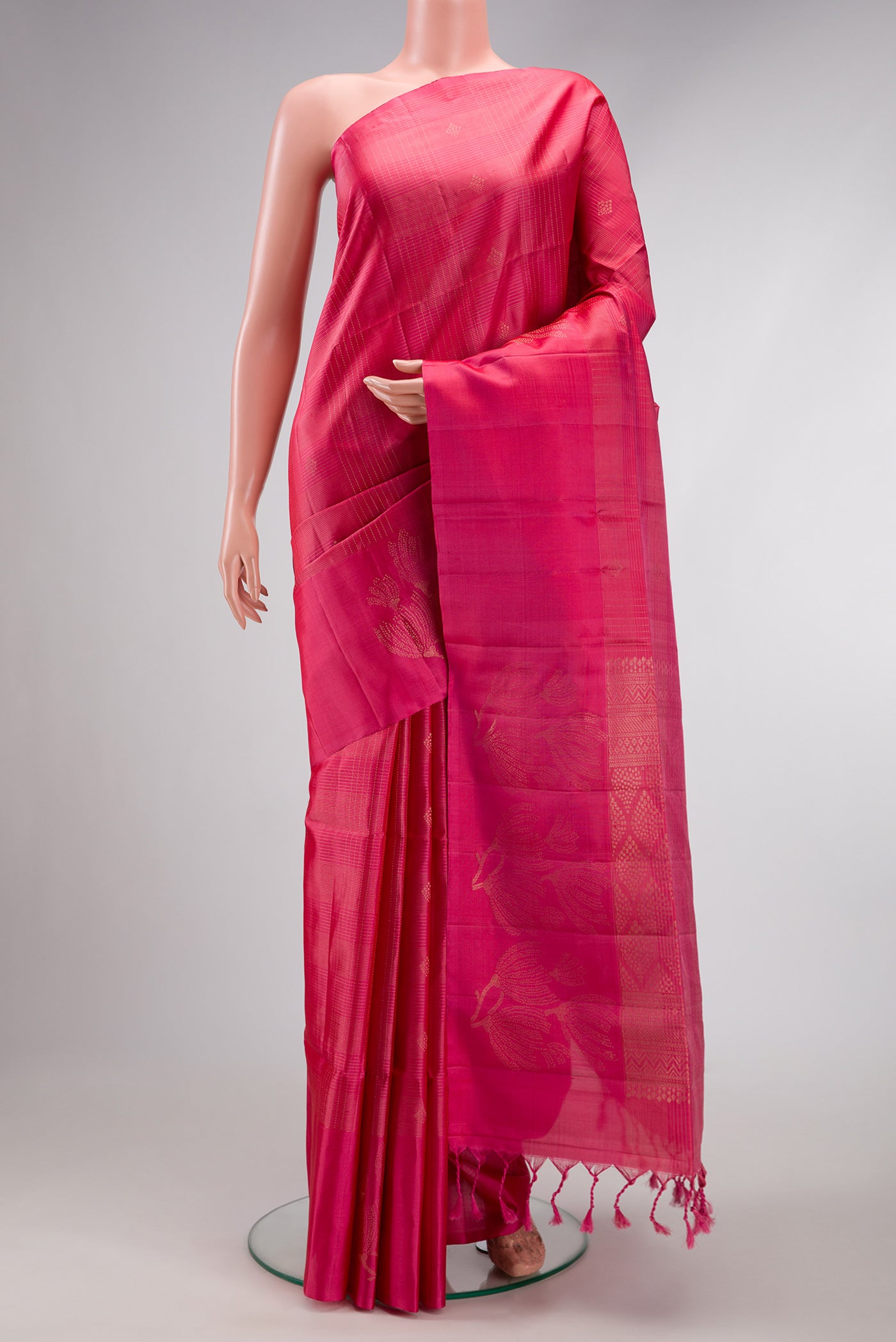 Pink Dual Tone Soft Silk Saree with Checked design on the body and Fancy Border.  displayed on a mannequin