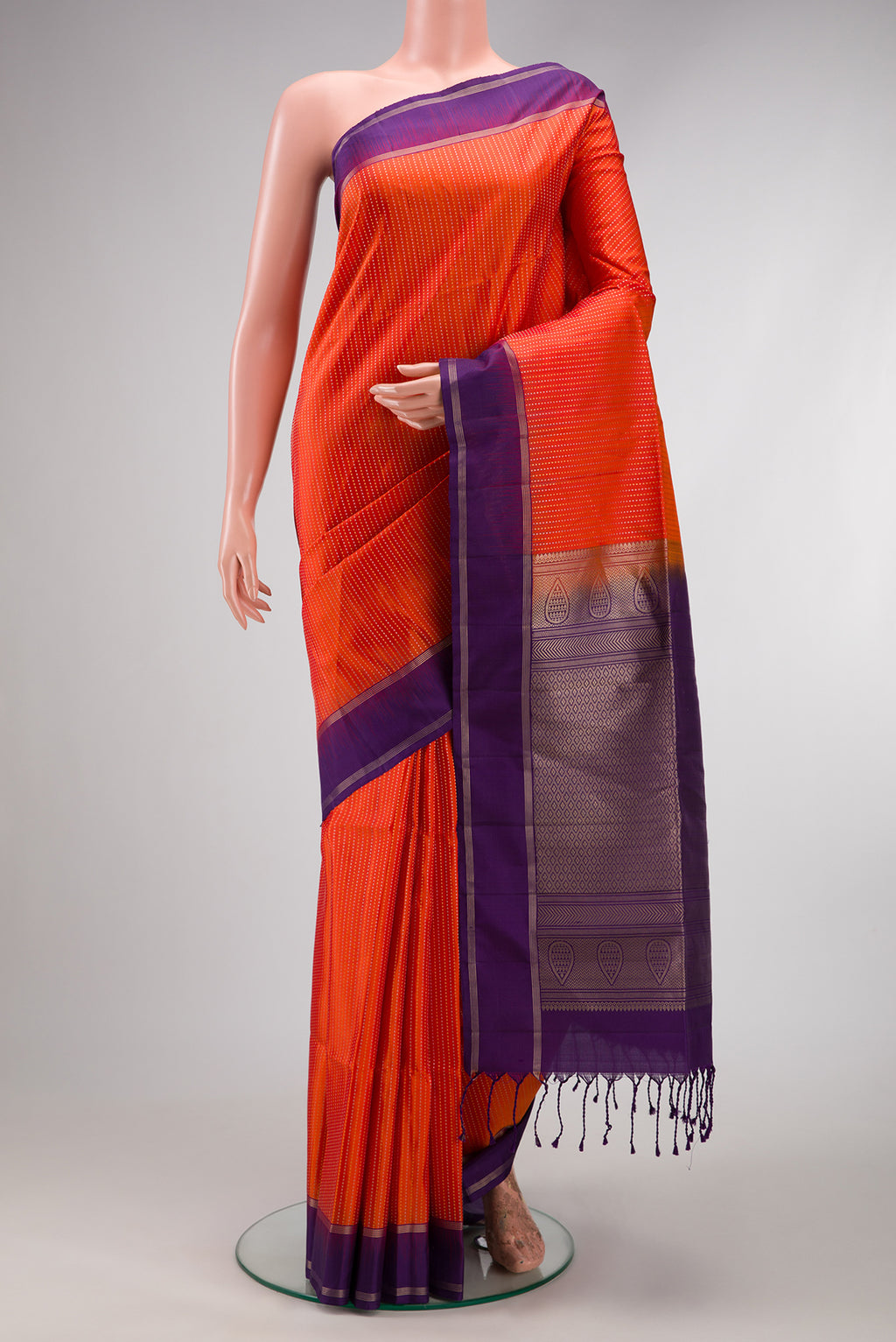 Beige and Off White Dual Tone Soft Silk Saree with Stripes on the body and Zari Border.  displayed on a mannequin