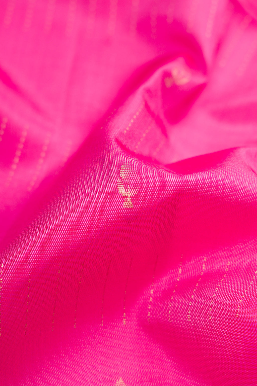Close up of Pink Soft Silk Saree with Stripes on the body and Fancy Border.  displaying folds