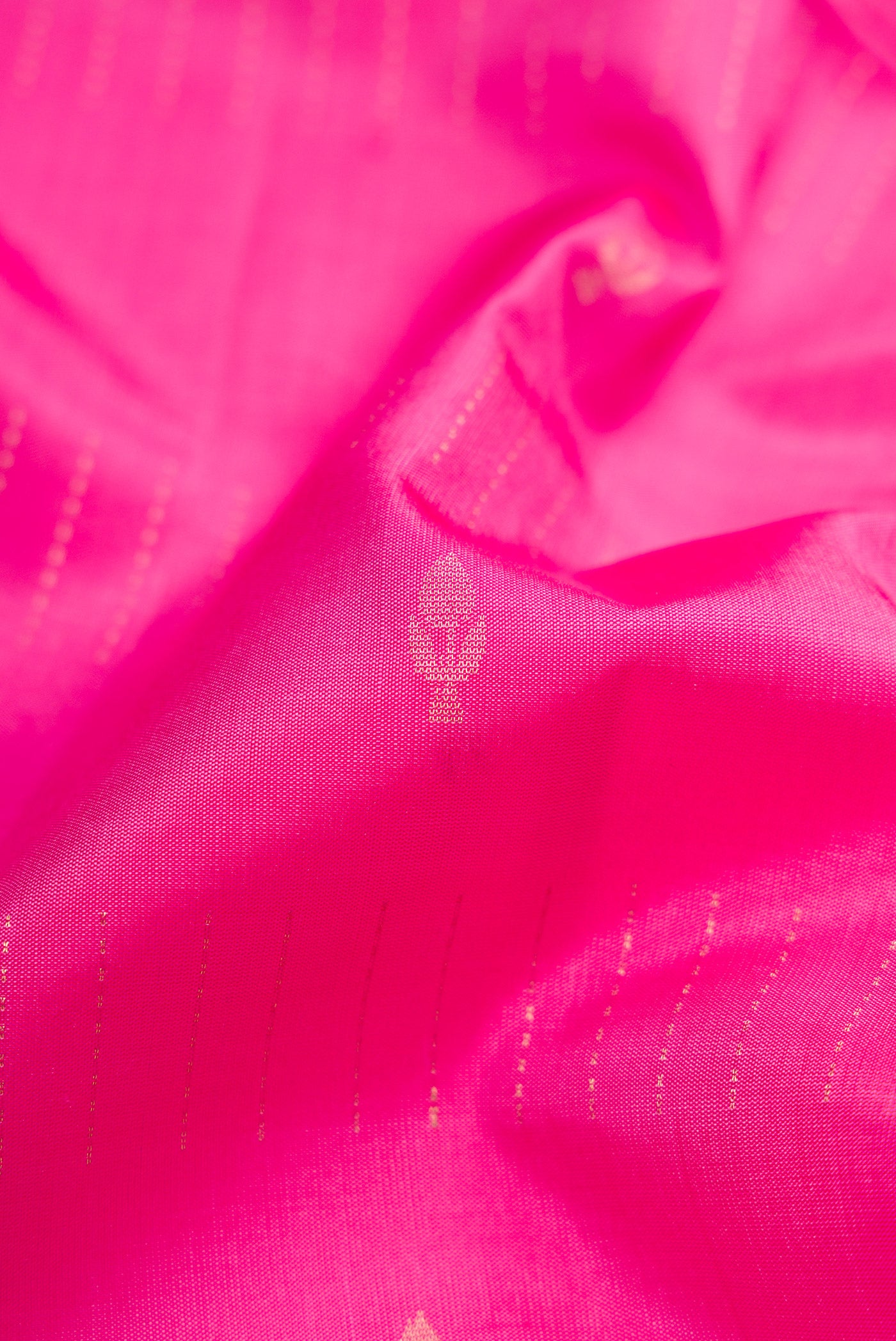Close up of Pink Soft Silk Saree with Stripes on the body and Fancy Border.  displaying folds