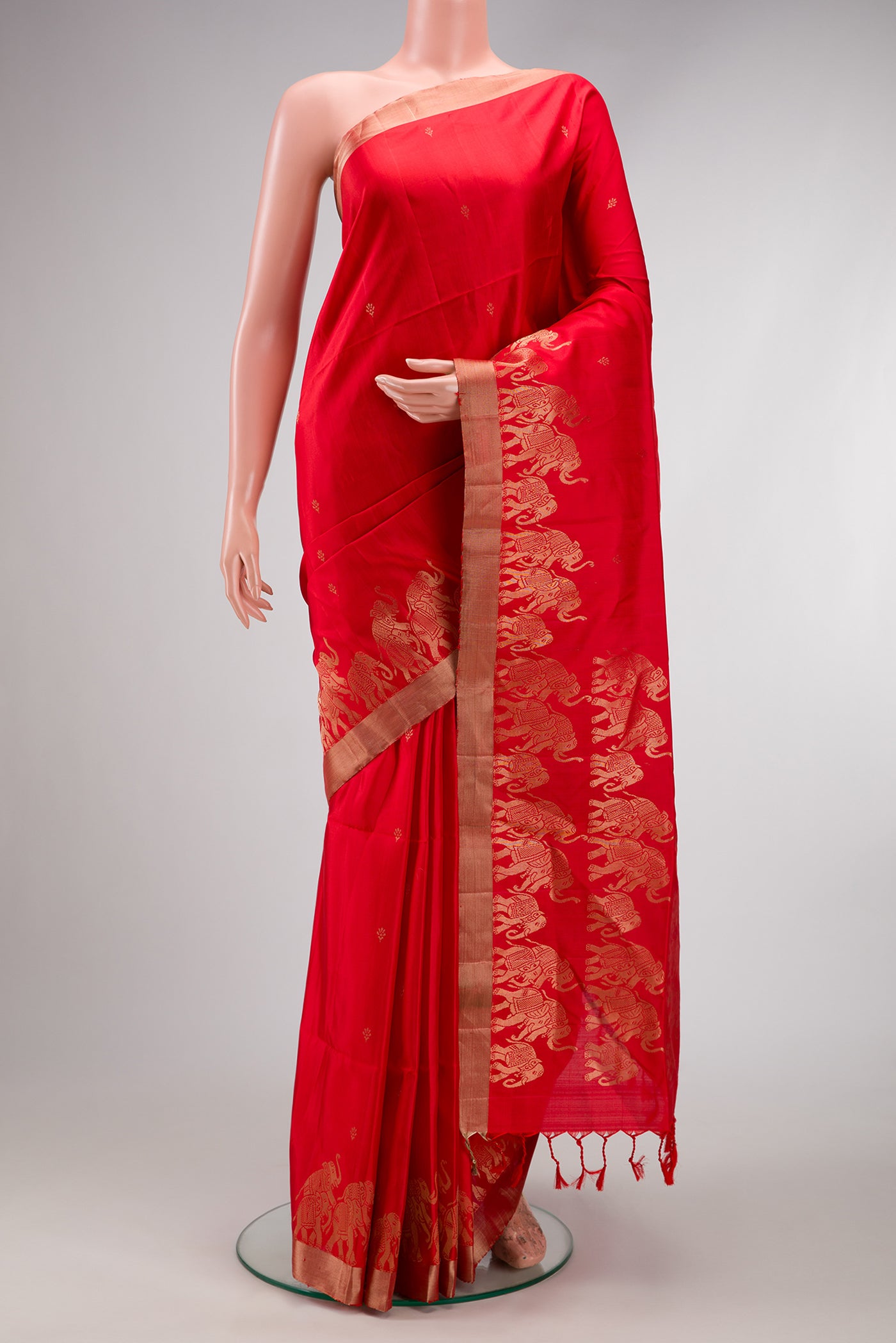 Red Dual Tone Soft Silk Saree with Zari Butta on the body and Fancy Border.  displayed on a mannequin