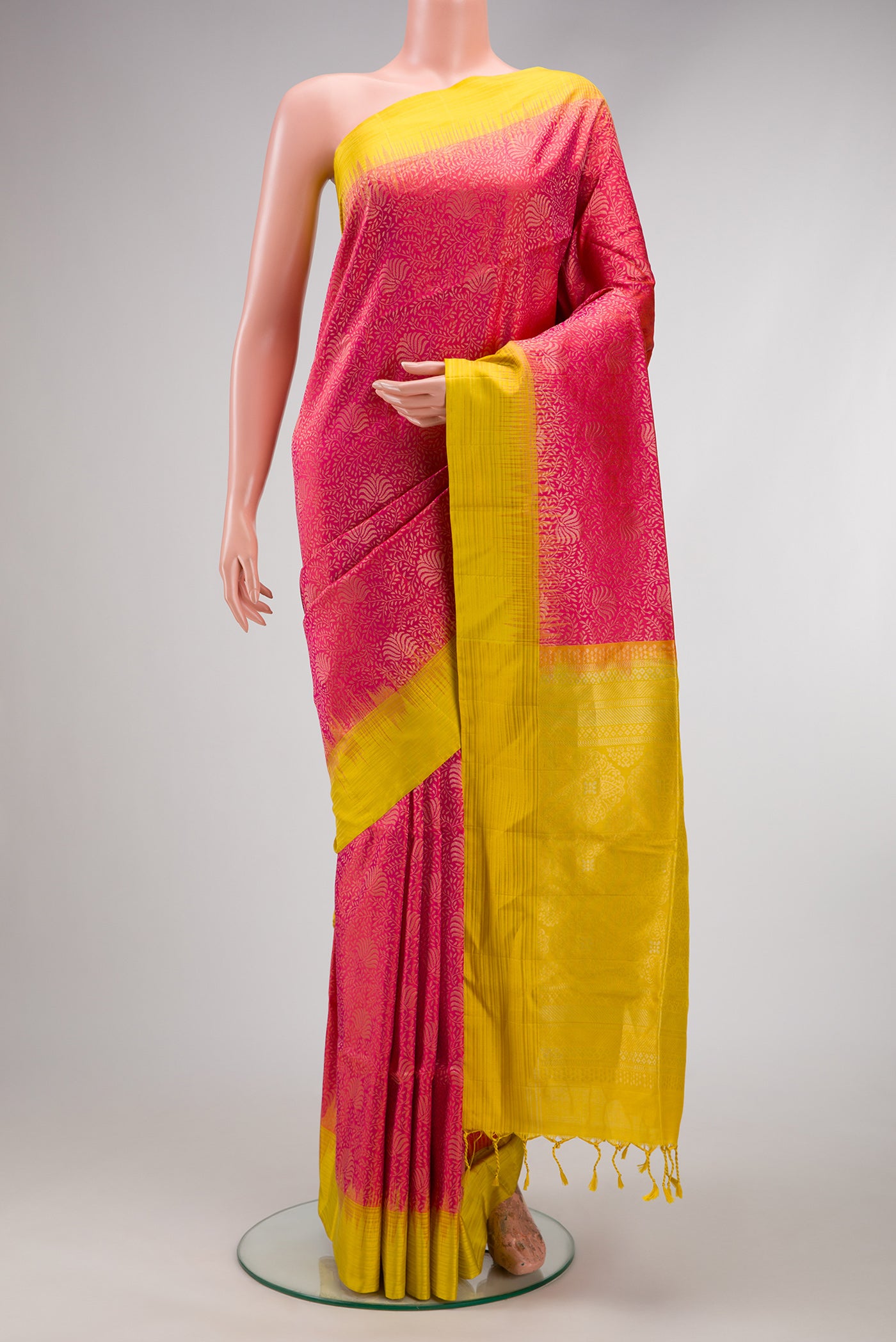 Pink Soft Silk Saree with Zari Brocade on the body and Plain Border.  displayed on a mannequin