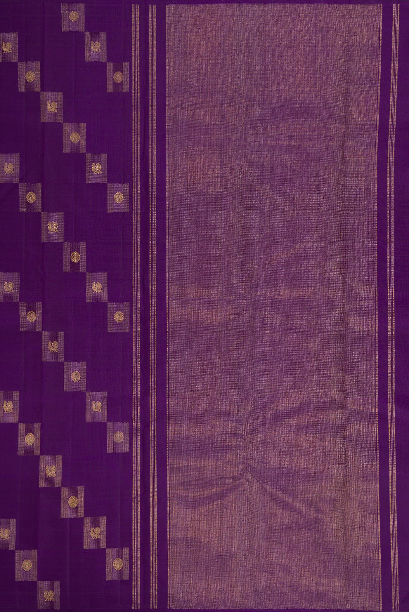 Close up image of the pallu of Pure Silk Pure Zari Violet Kanjivaram Saree with Zari Butta on the body and Without Border. 