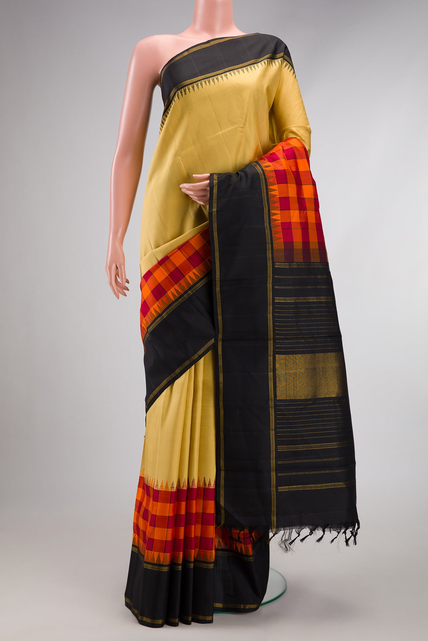 Sandal Kanchipuram Silk Saree with Stripes on the body and Fancy Border.  displayed on a mannequin