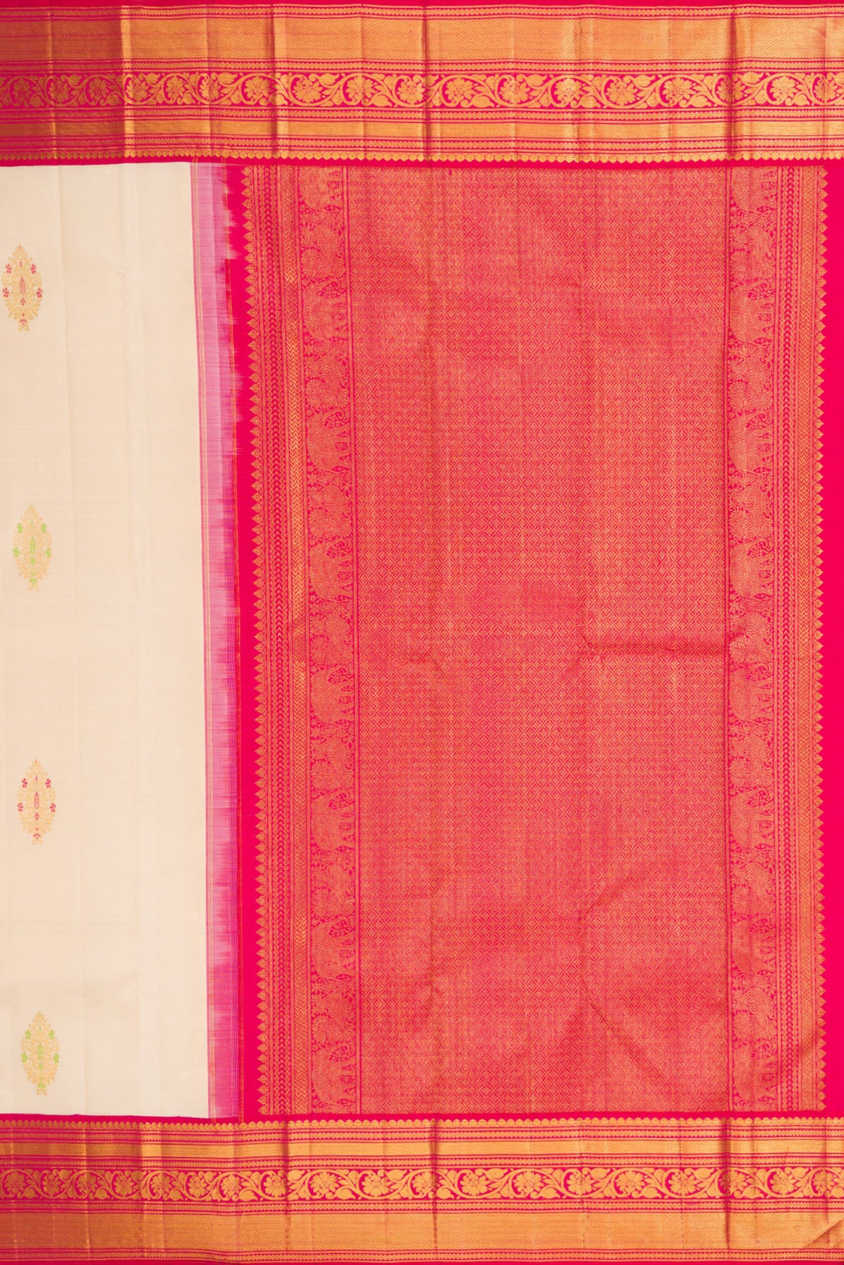 Close up image of the pallu of Off White Kanchipuram Silk Saree with Zari And Thread Butta on the body and Zari Border. 