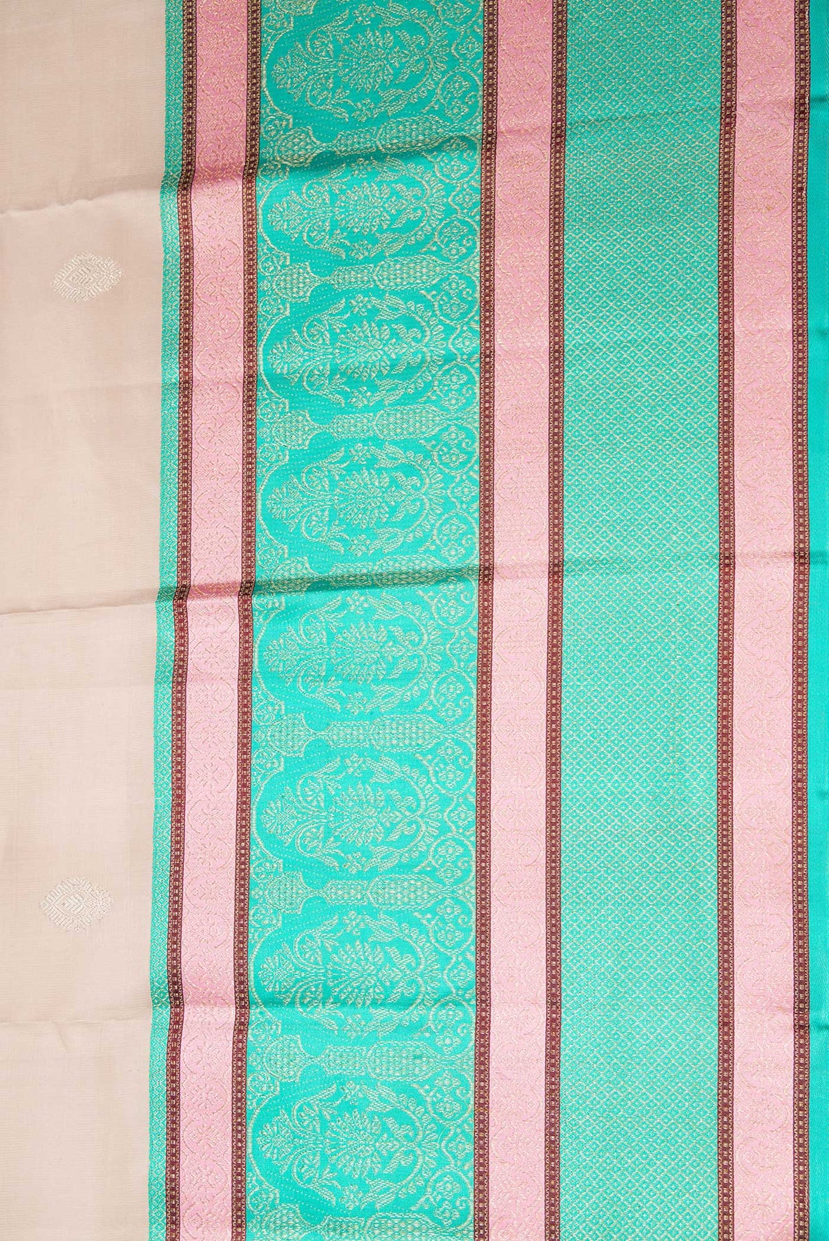 Border image of Beige Dual Tone Kanchipuram Silk Saree with Zari Butta on the body and Zari And Thread Border. 