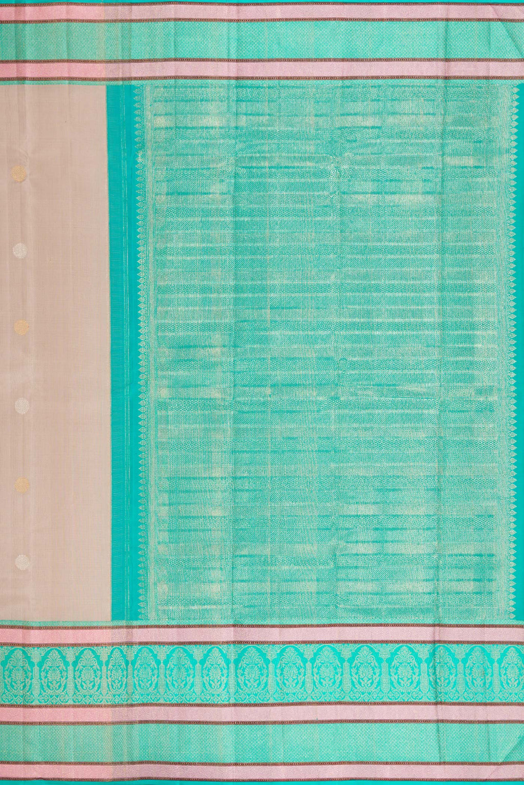 Close up image of the pallu of Beige Dual Tone Kanchipuram Silk Saree with Zari Butta on the body and Zari And Thread Border. 