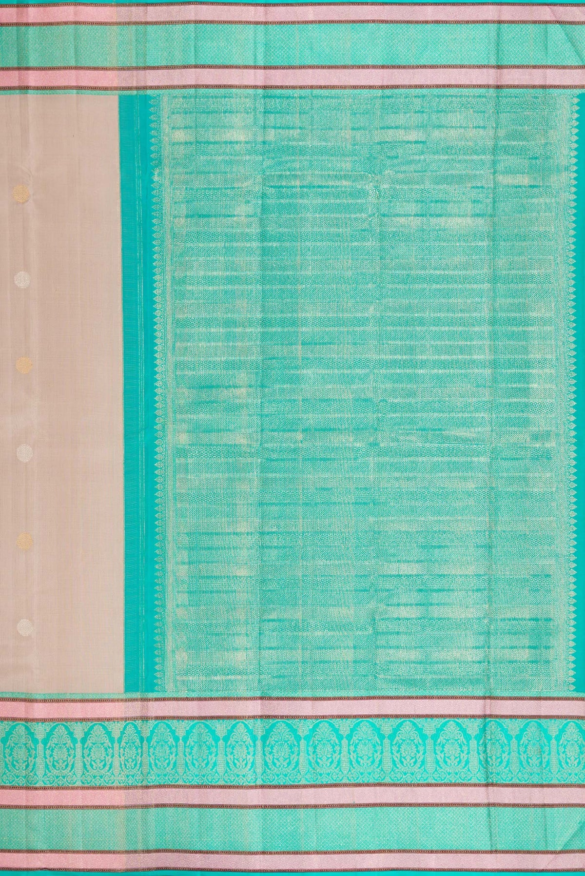 Close up image of the pallu of Beige Dual Tone Kanchipuram Silk Saree with Zari Butta on the body and Zari And Thread Border. 