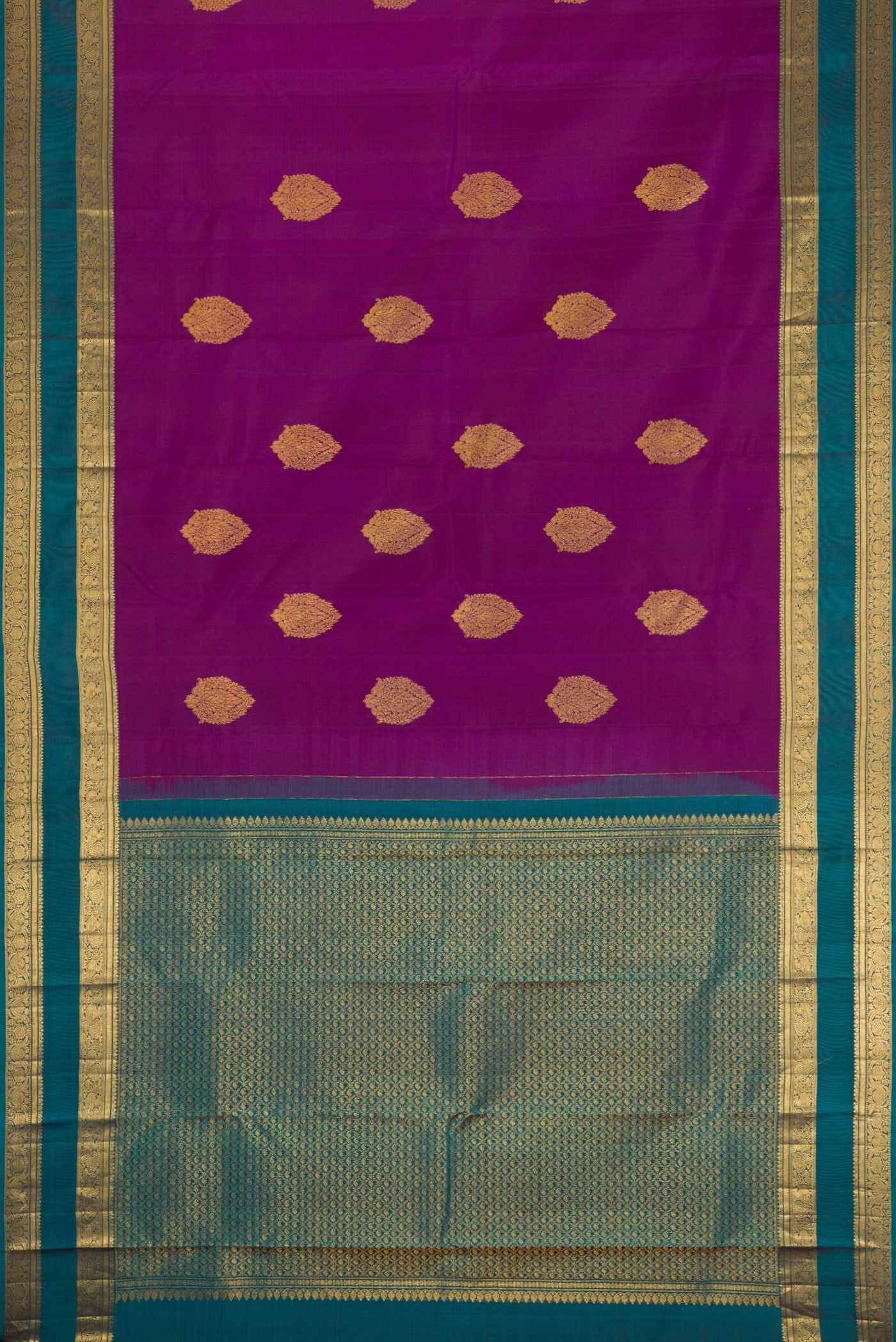 Flat view of Purple Kanchipuram Silk Saree with Zari Butta on the body and Zari Border. 