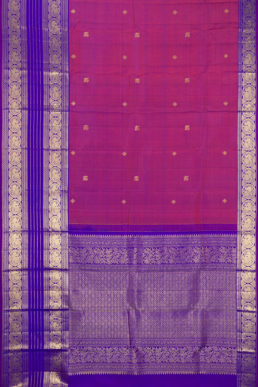 Flat view of Purple Kanchipuram Silk Saree with Zari Butta on the body and Zari Border. 