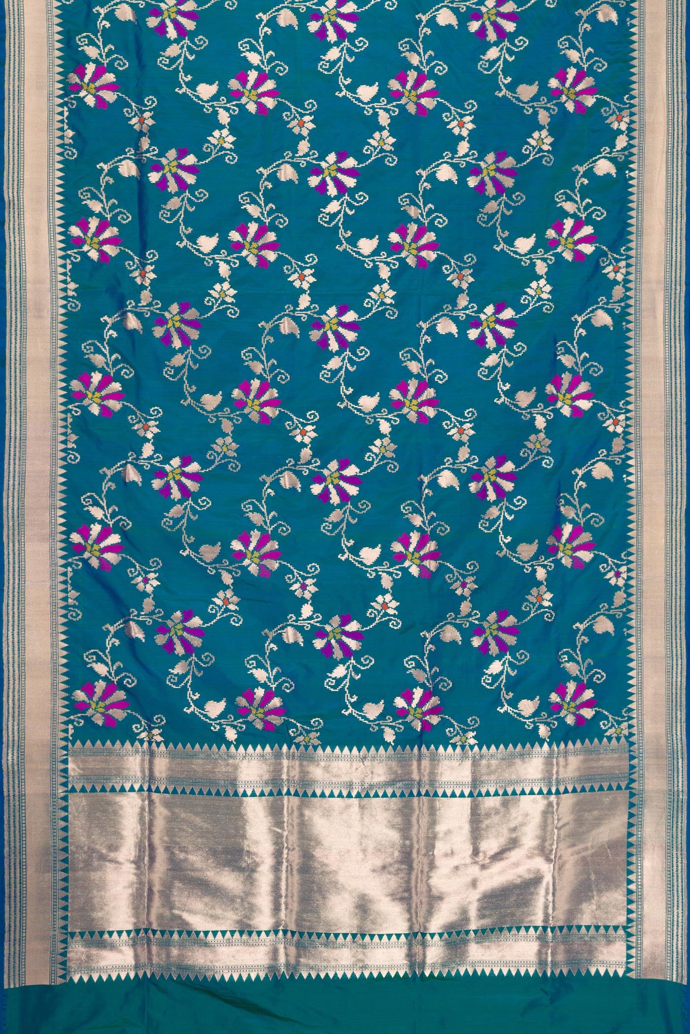 Flat view of Peacock Blue Dual Tone Banarasi Silk Saree with Zari Butta on the body and Zari Border. 