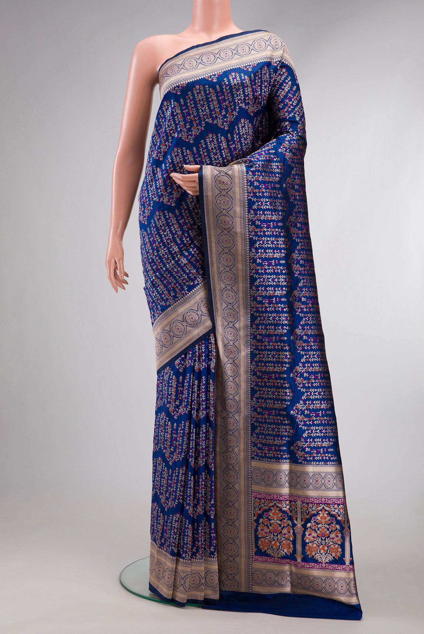 Royal Blue Dual Tone Banarasi Silk Saree with Zari Brocade on the body and Zari Border.  displayed on a mannequin
