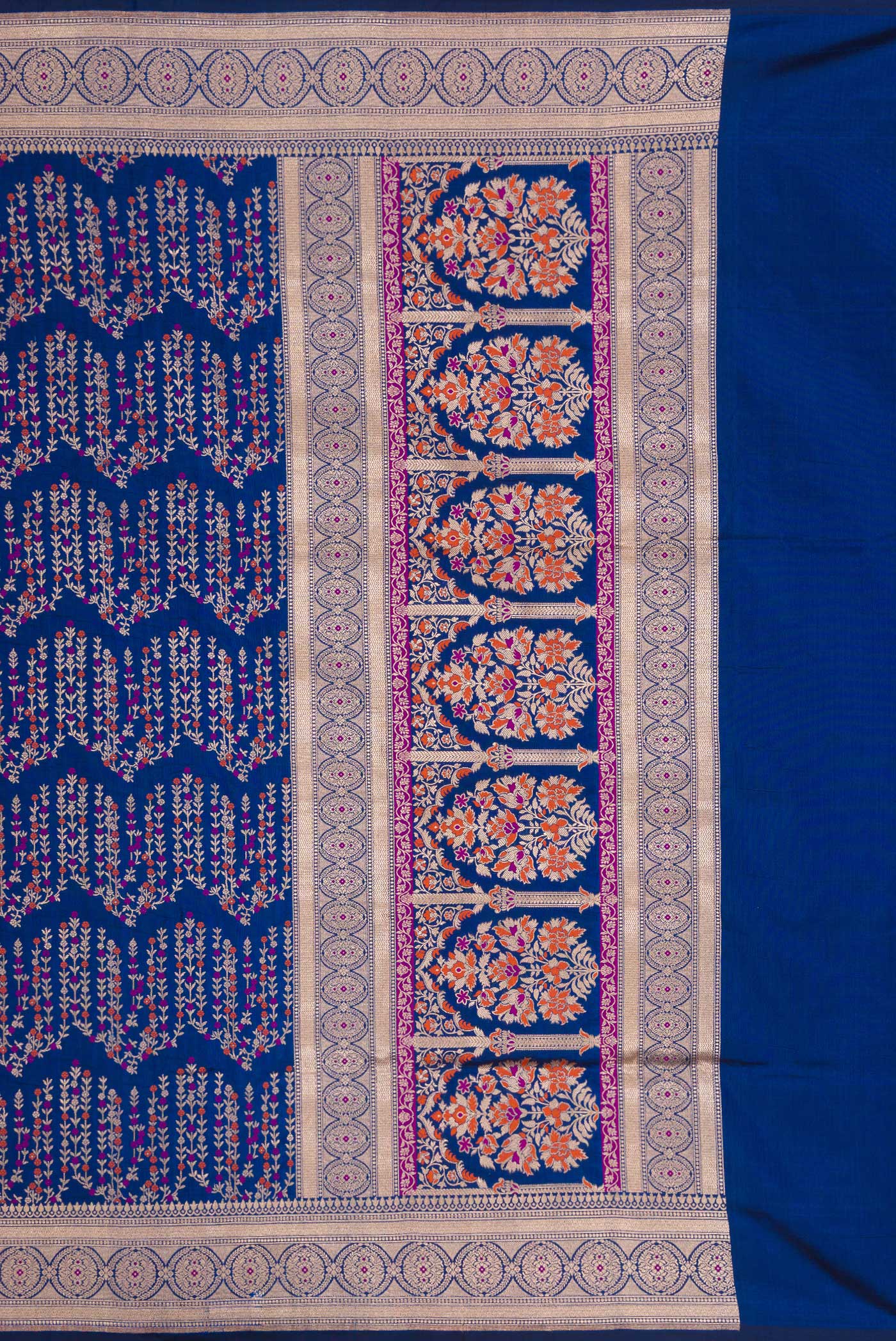 Close up image of the pallu of Royal Blue Dual Tone Banarasi Silk Saree with Zari Brocade on the body and Zari Border. 