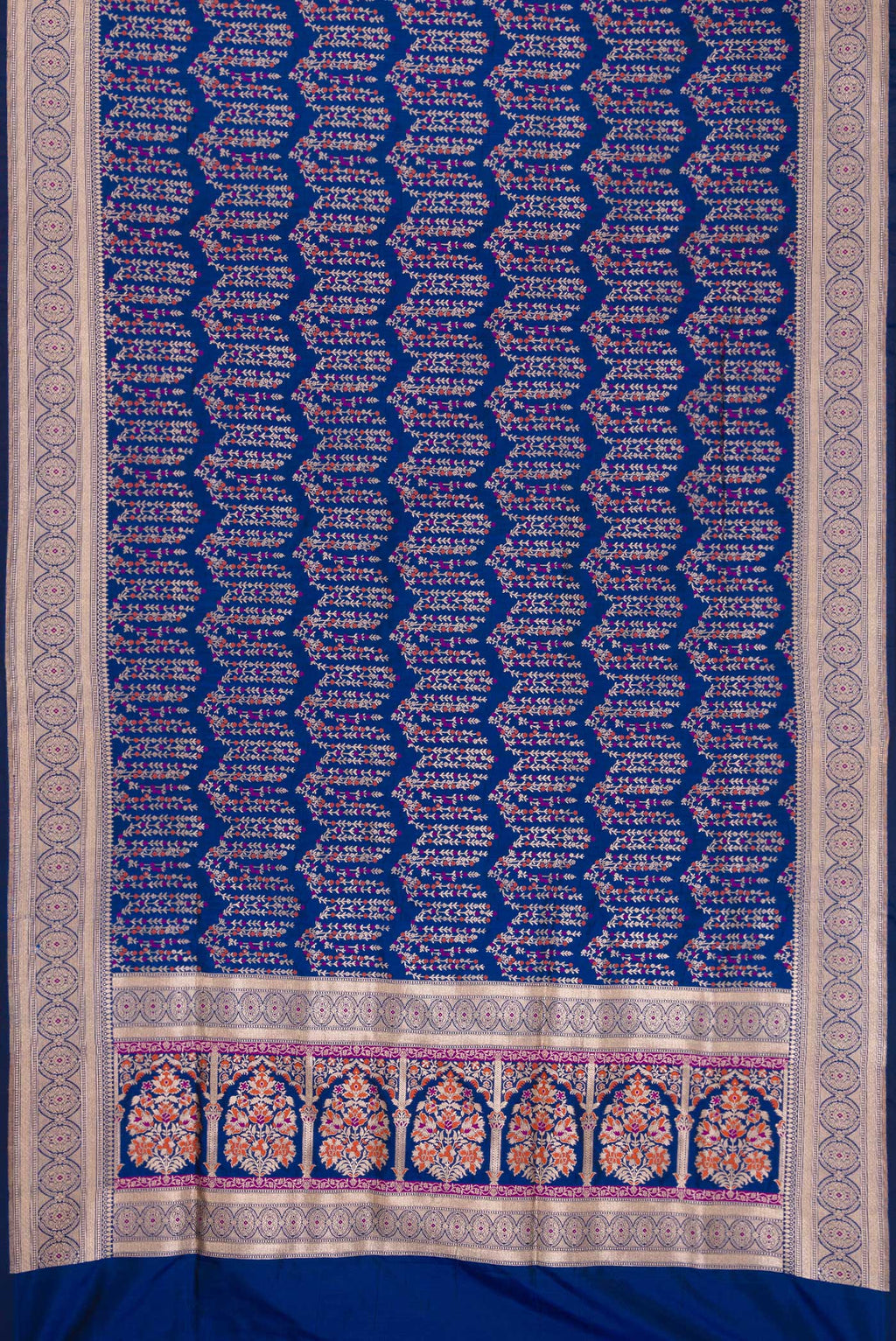 Flat view of Royal Blue Dual Tone Banarasi Silk Saree with Zari Brocade on the body and Zari Border. 