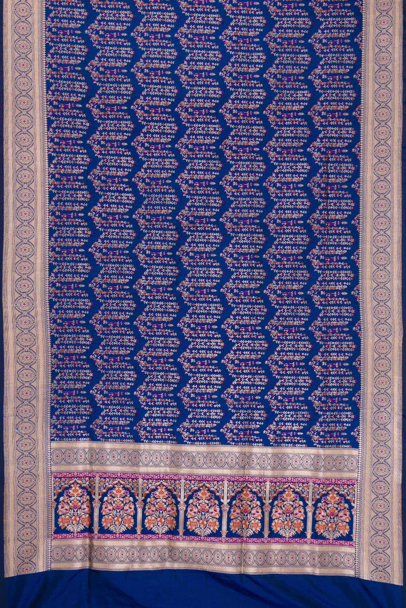 Flat view of Royal Blue Dual Tone Banarasi Silk Saree with Zari Brocade on the body and Zari Border. 