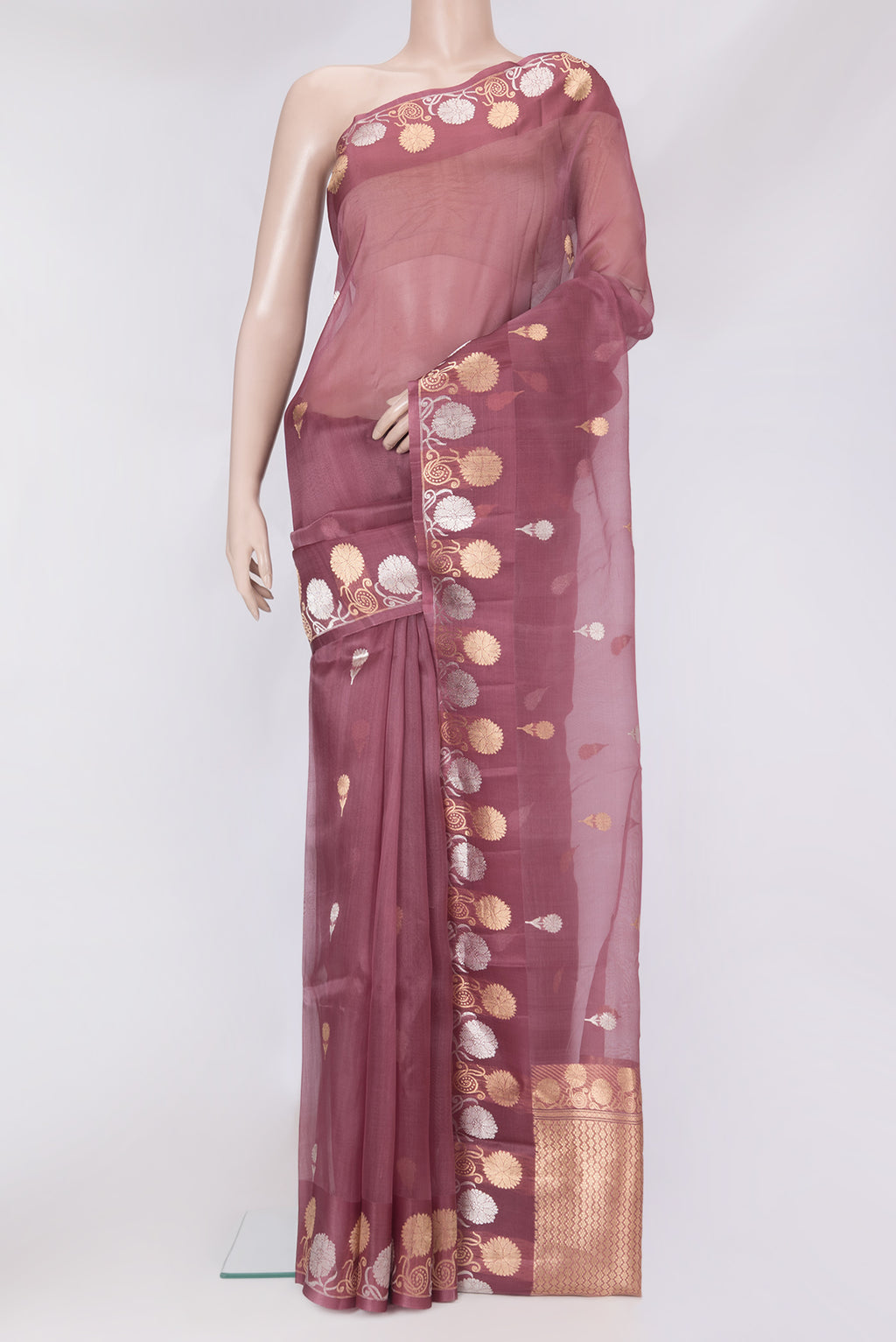 Pink Organza Silk Saree with Zari Butta on the body and Fancy Border.  displayed on a mannequin