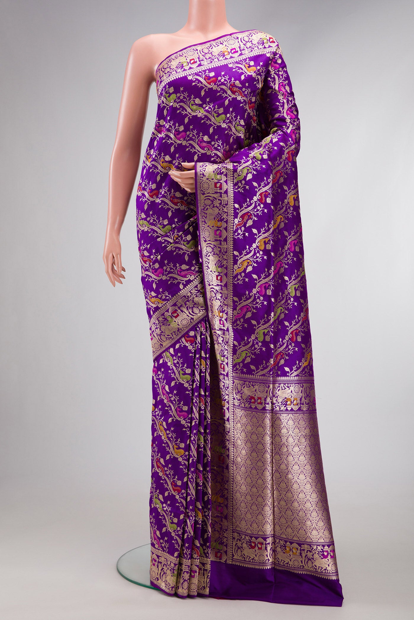 Violet Dual Tone Banarasi Silk Saree with Zari Butta on the body and Zari Border.  displayed on a mannequin