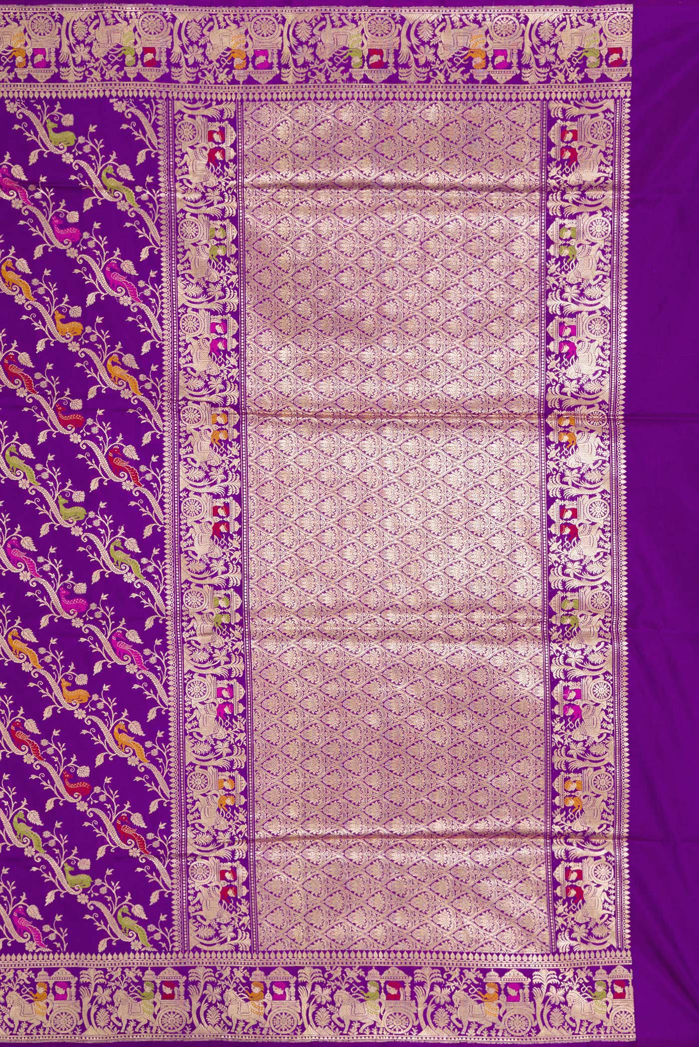 Close up image of the pallu of Violet Dual Tone Banarasi Silk Saree with Zari Butta on the body and Zari Border. 