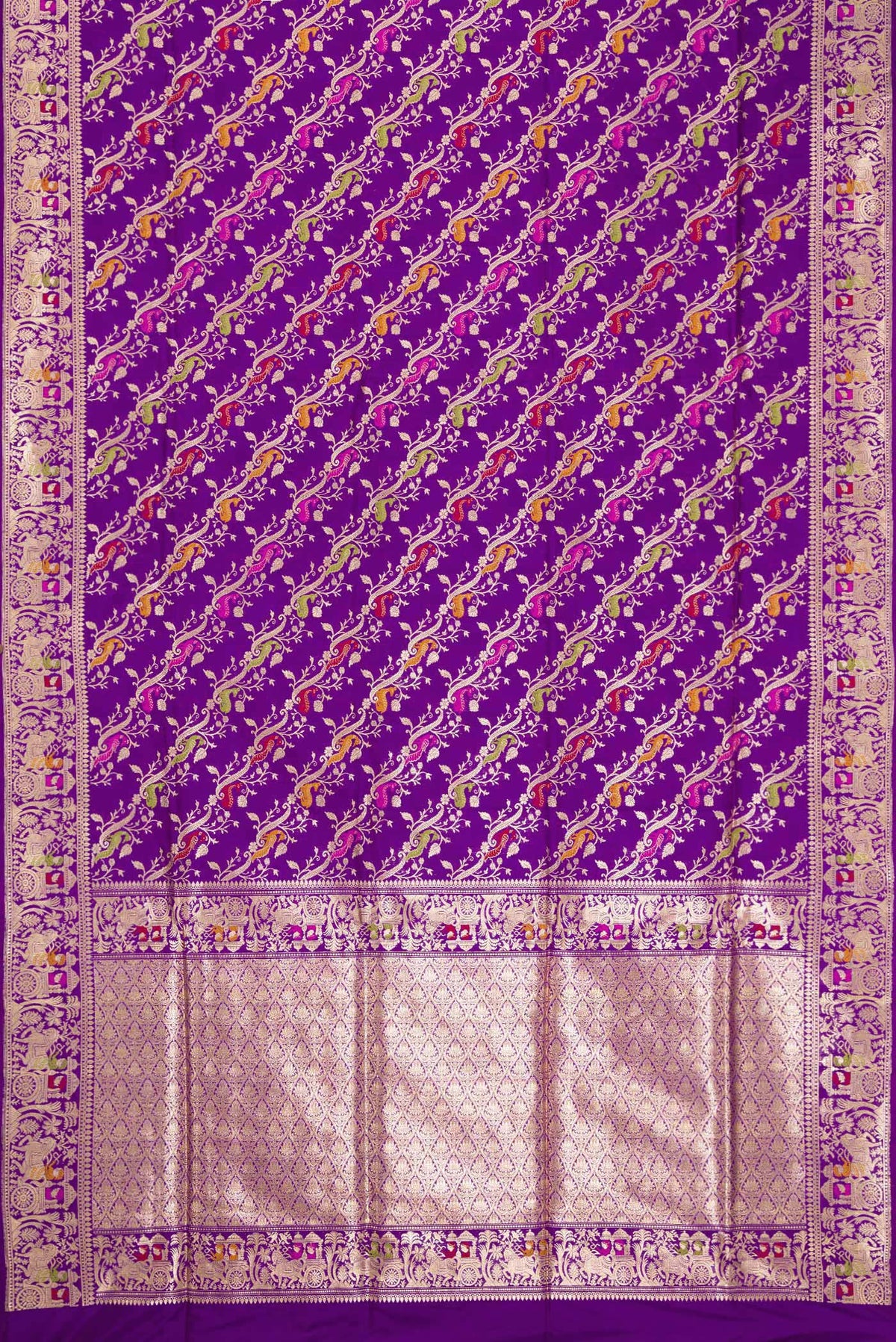 Flat view of Violet Dual Tone Banarasi Silk Saree with Zari Butta on the body and Zari Border. 