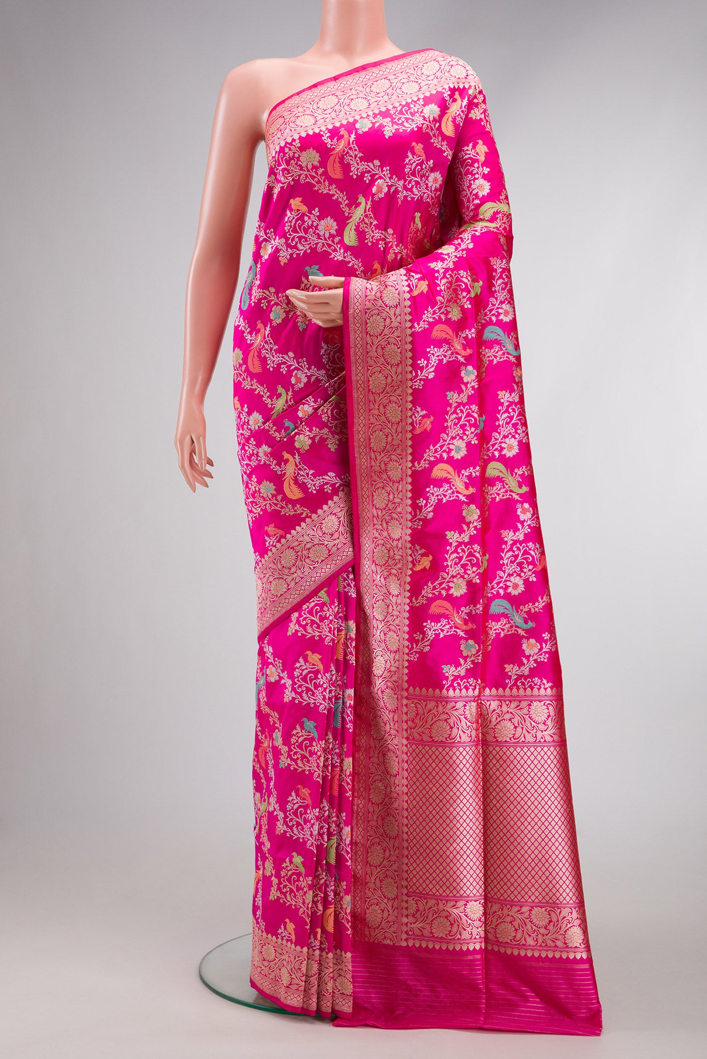Dark Pink Dual Tone Banarasi Silk Saree with Zari Brocade on the body and Zari Border.  displayed on a mannequin