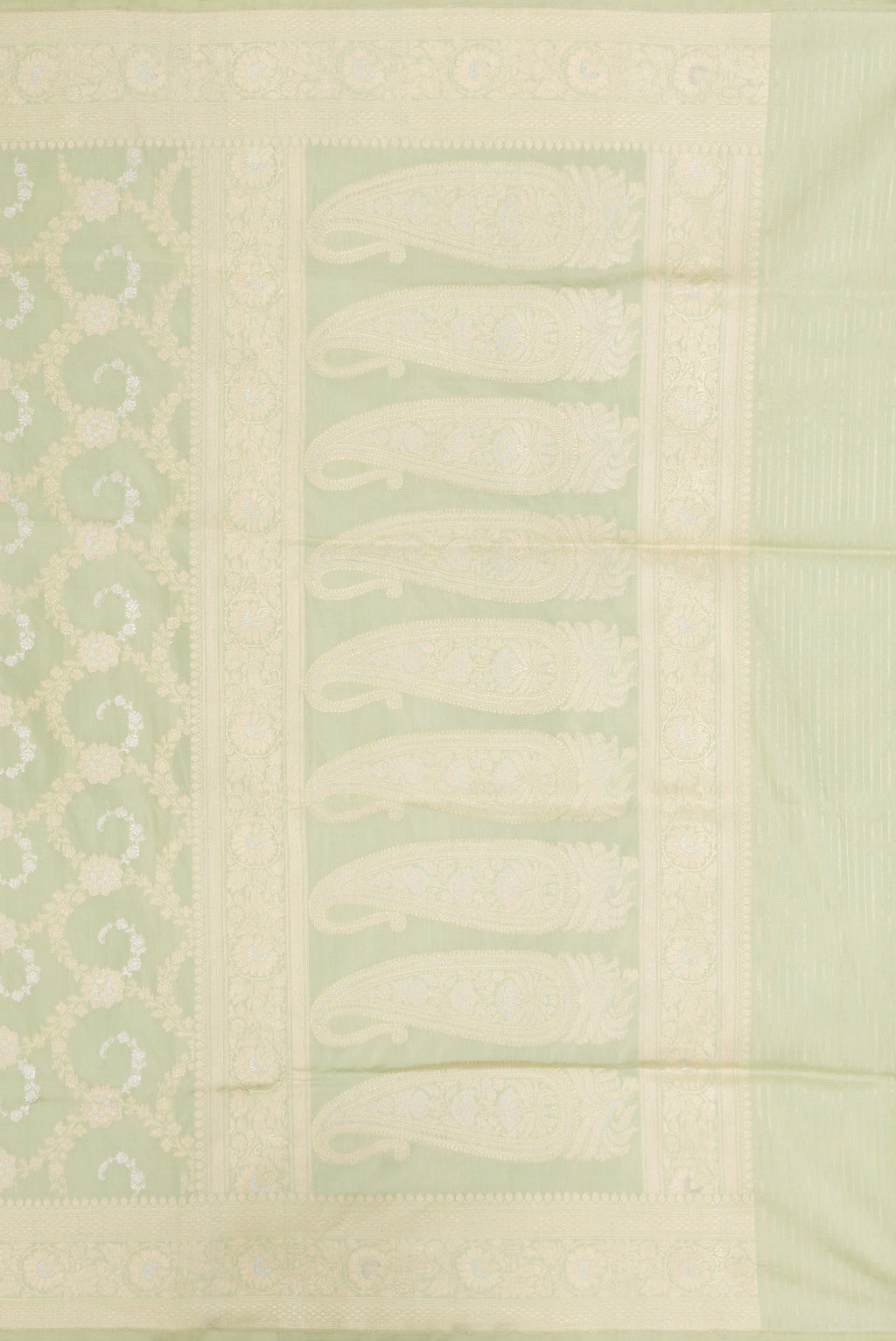 Close up image of the pallu of Pista Green Dual Tone Banarasi Silk Saree with Zari Brocade on the body and Zari Border. 