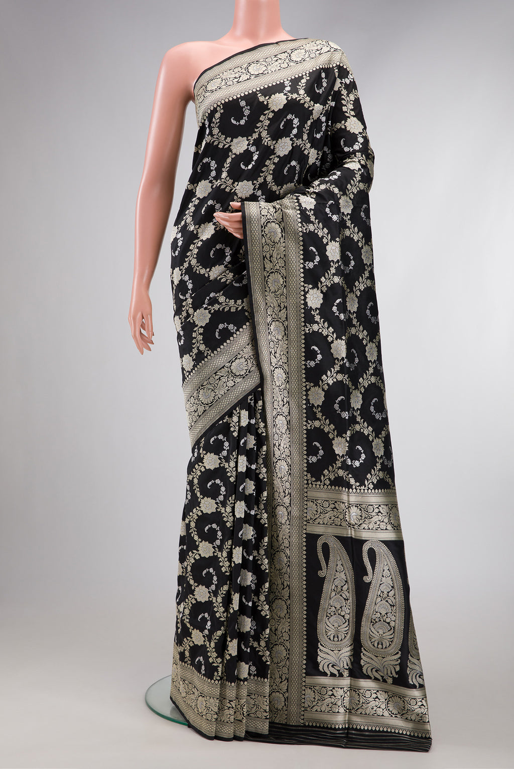Black Dual Tone Banarasi Silk Saree with Zari Butta on the body and Zari Border.  displayed on a mannequin
