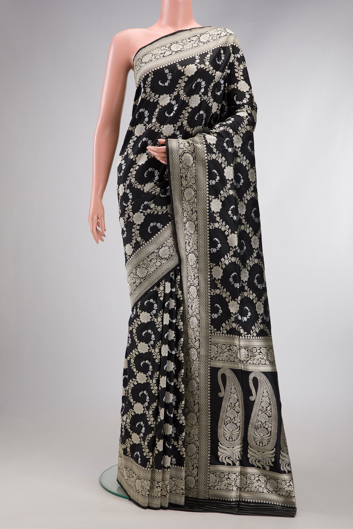Black Dual Tone Banarasi Silk Saree with Zari Butta on the body and Zari Border.  displayed on a mannequin