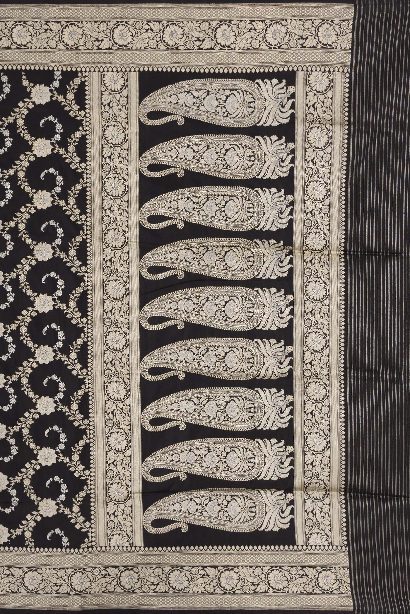 Close up image of the pallu of Black Dual Tone Banarasi Silk Saree with Zari Butta on the body and Zari Border. 