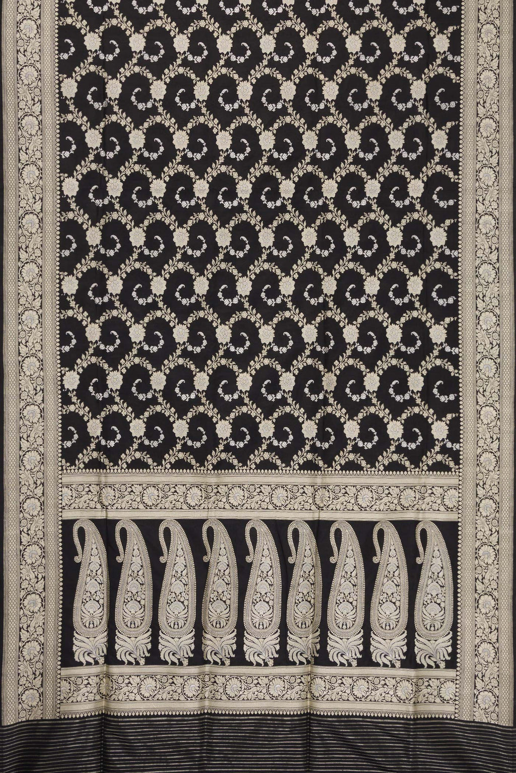 Flat view of Black Dual Tone Banarasi Silk Saree with Zari Butta on the body and Zari Border. 