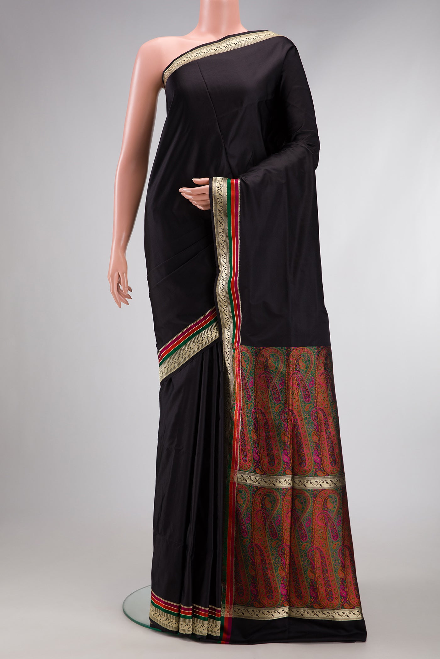 Black Banarasi Silk Saree with Plain Body and Zari Border.  displayed on a mannequin