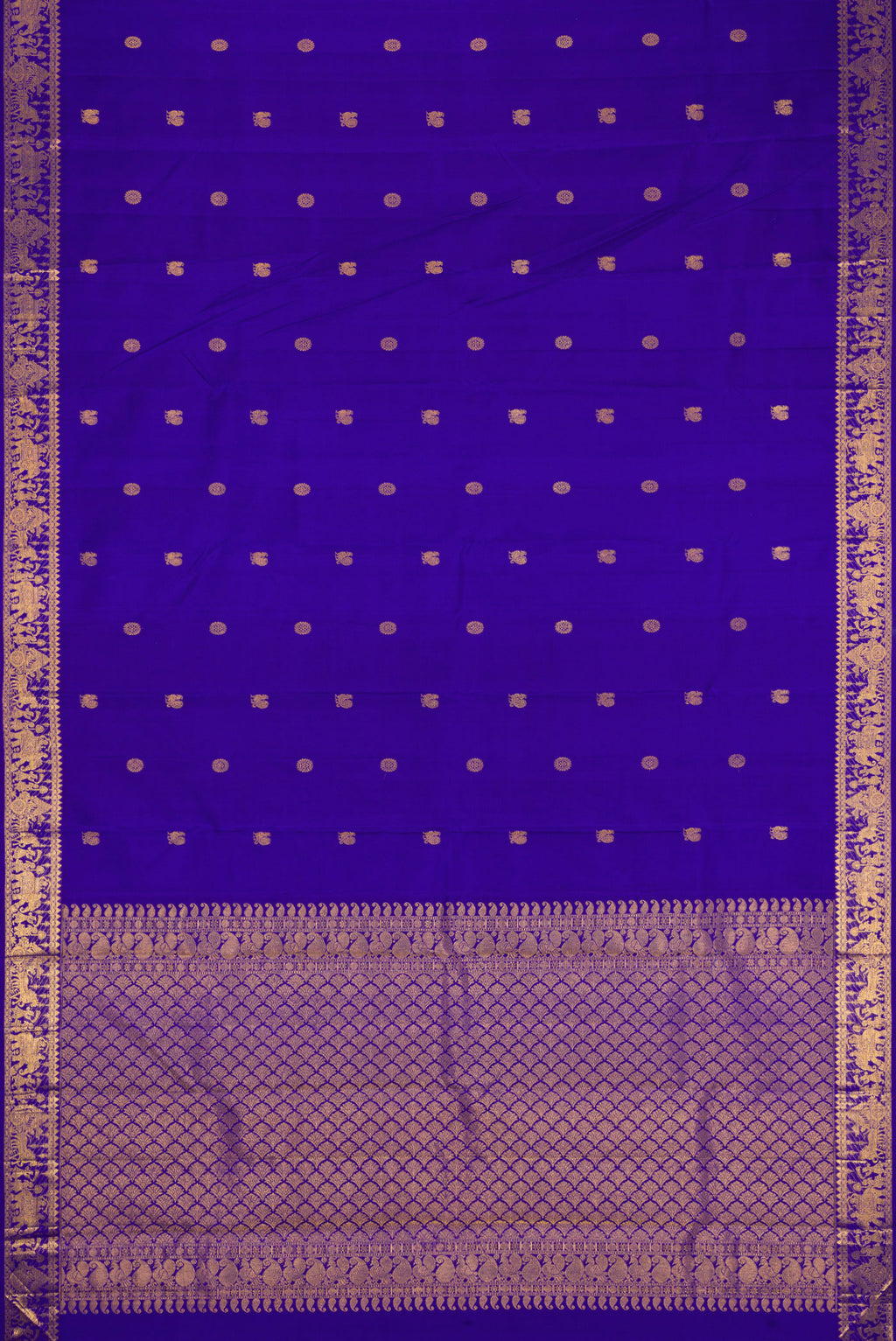 Flat view of Royal Blue Kanjivaram Silk Saree with Zari Butta on the body and Zari Border. 