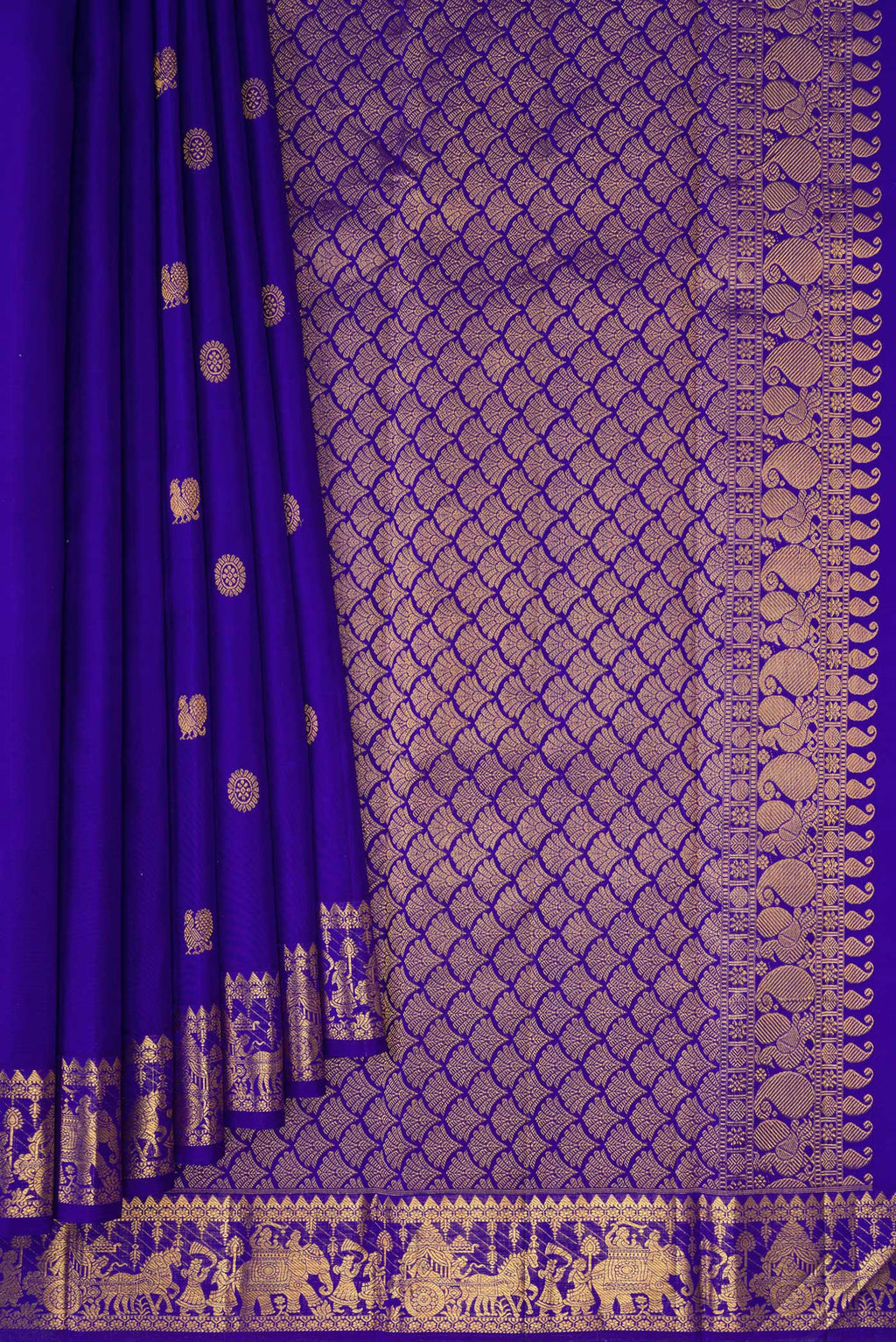 Pleats and pallu of Royal Blue Kanjivaram Silk Saree with Zari Butta on the body and Zari Border. 