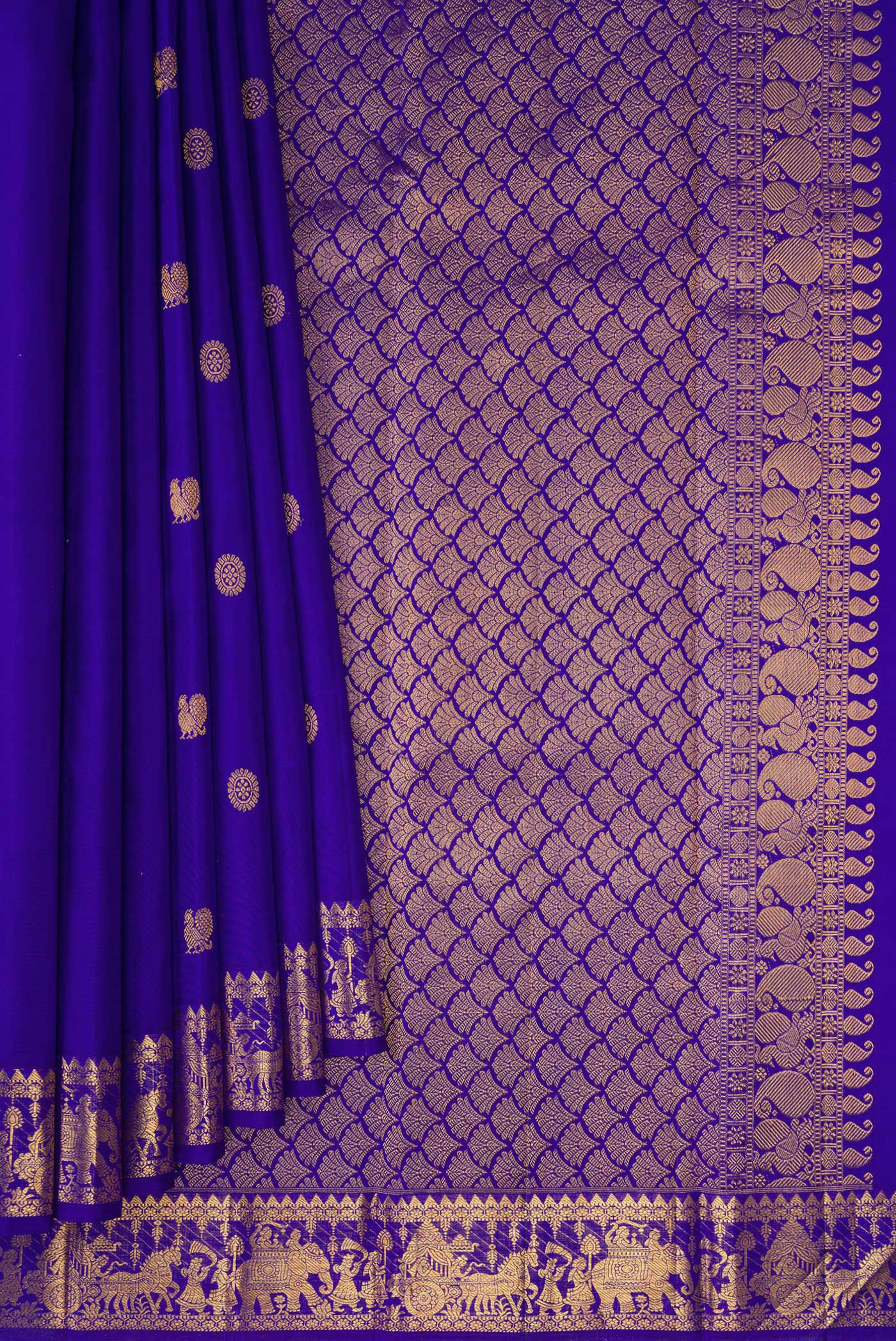 Pleats and pallu of Royal Blue Kanjivaram Silk Saree with Zari Butta on the body and Zari Border. 